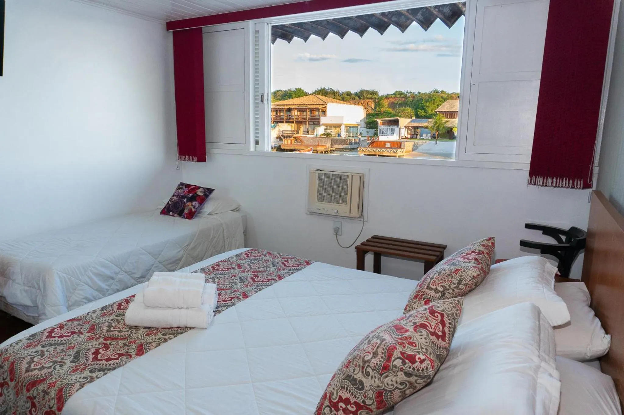 Bed in Pousada Marilia