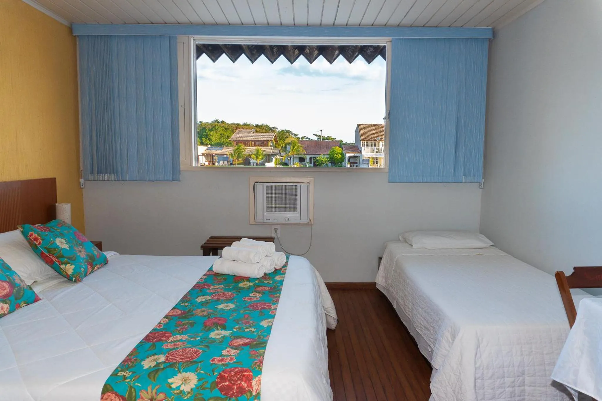 Bed in Pousada Marilia