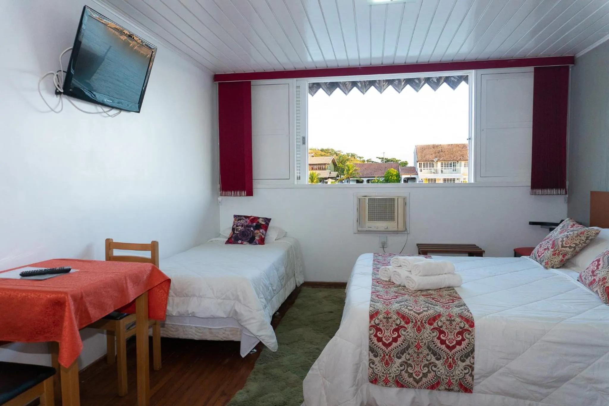 Bed in Pousada Marilia