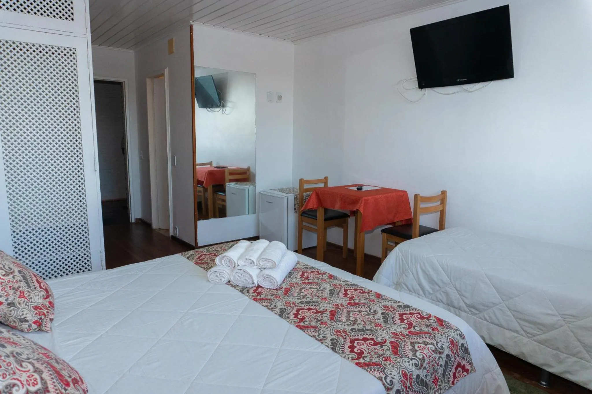 Bed in Pousada Marilia