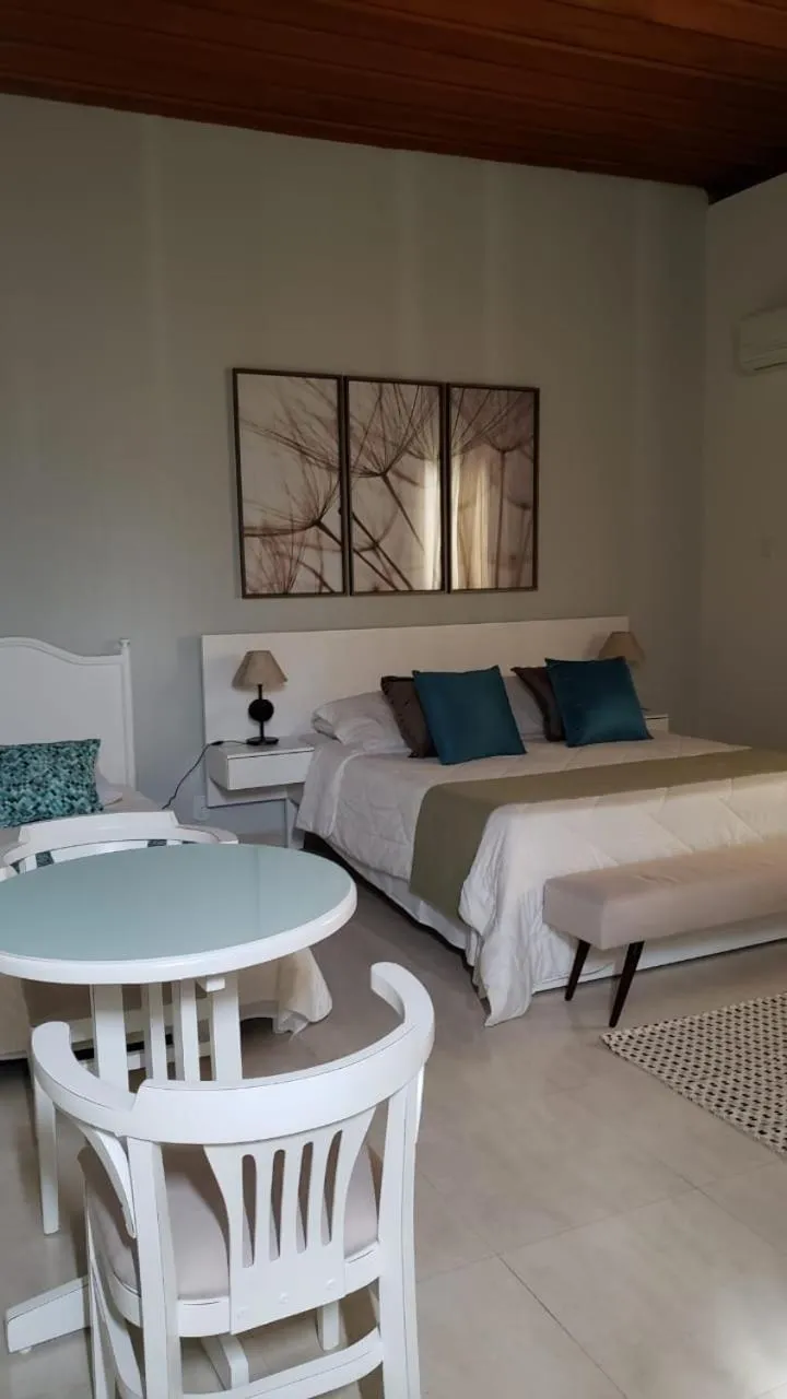 Bed in Pousada Marilia