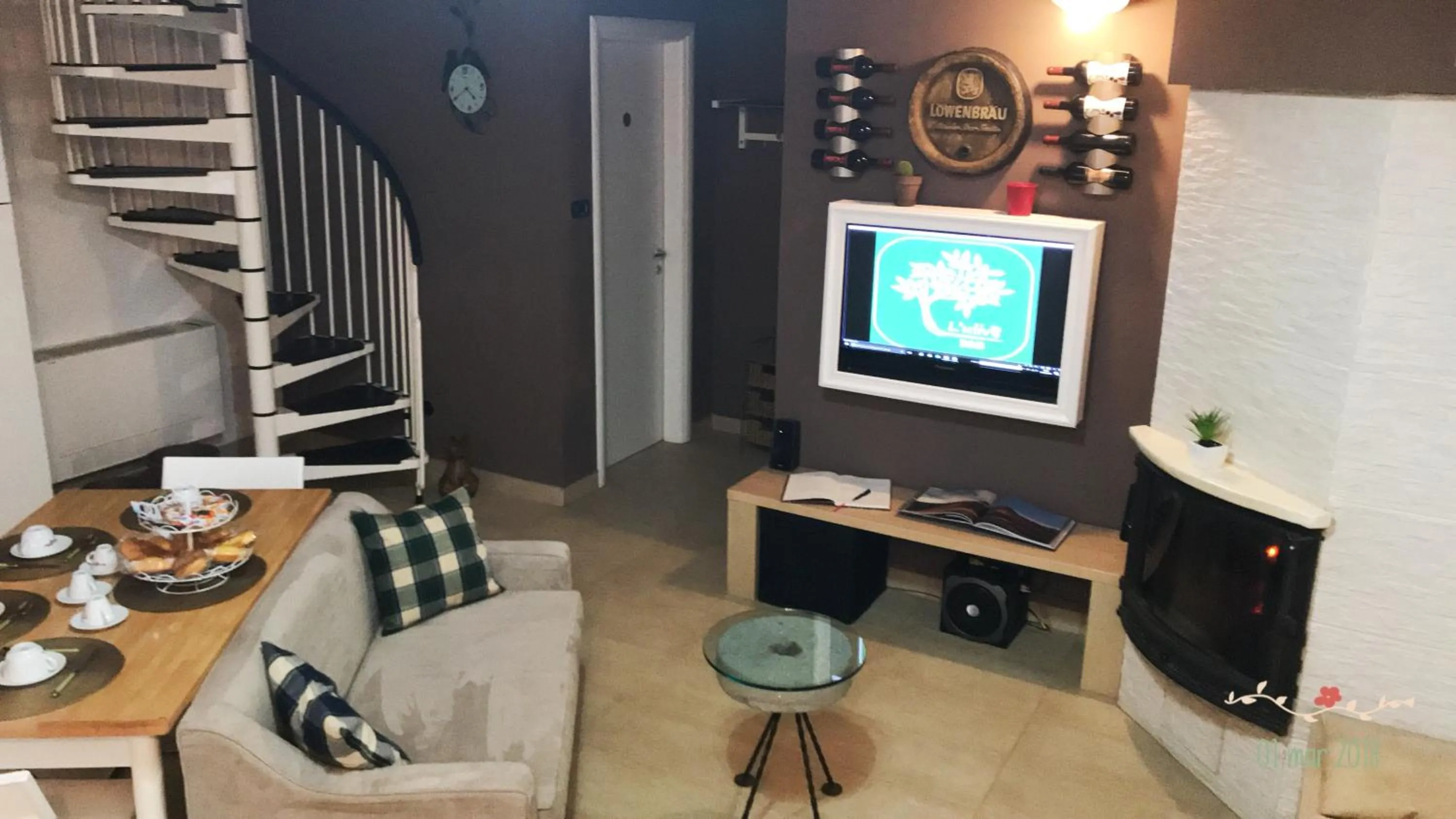 Communal lounge/ TV room in L' Ulivo Bed & Breakfast