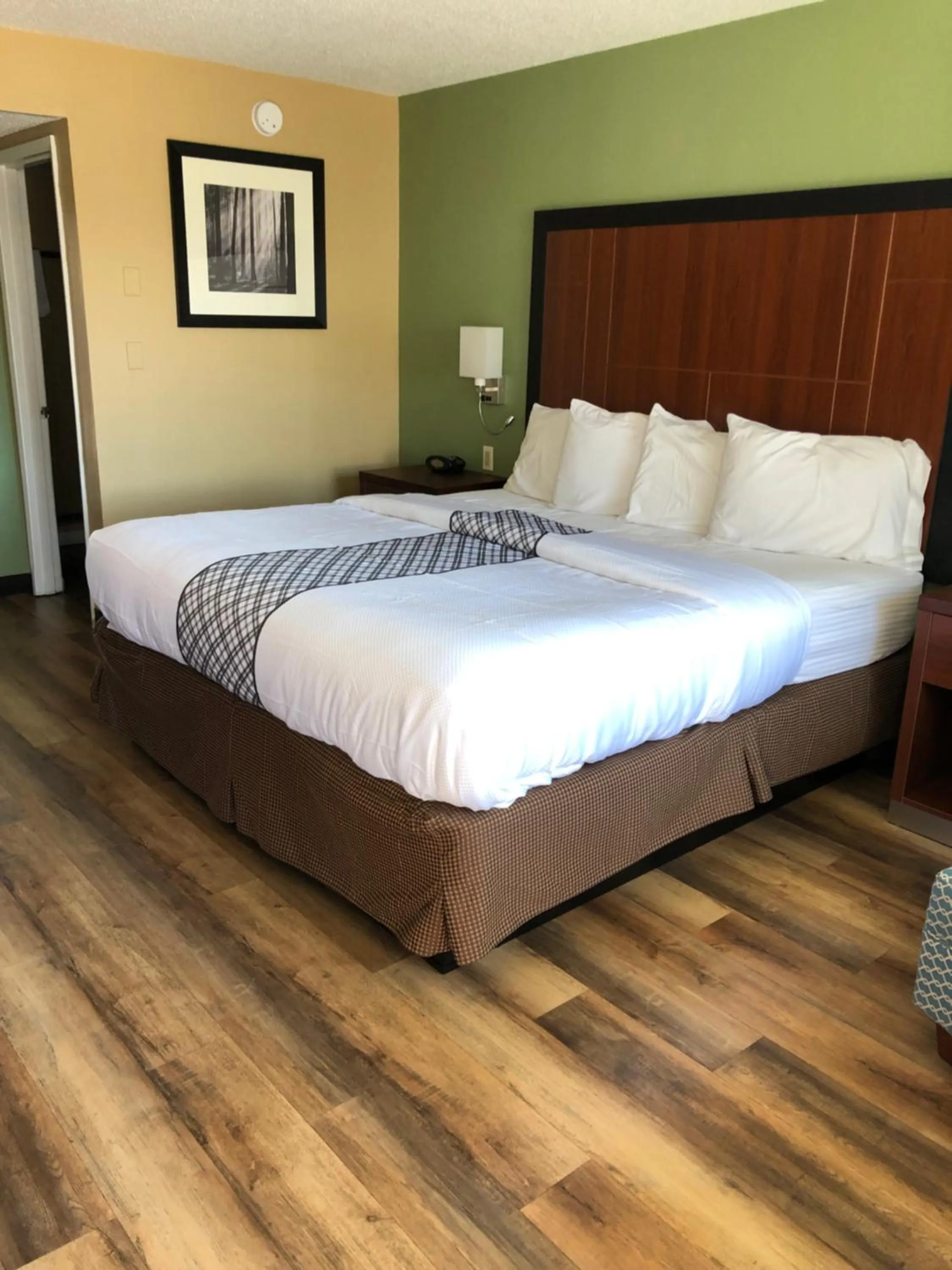 Bed in Knights Inn Motel