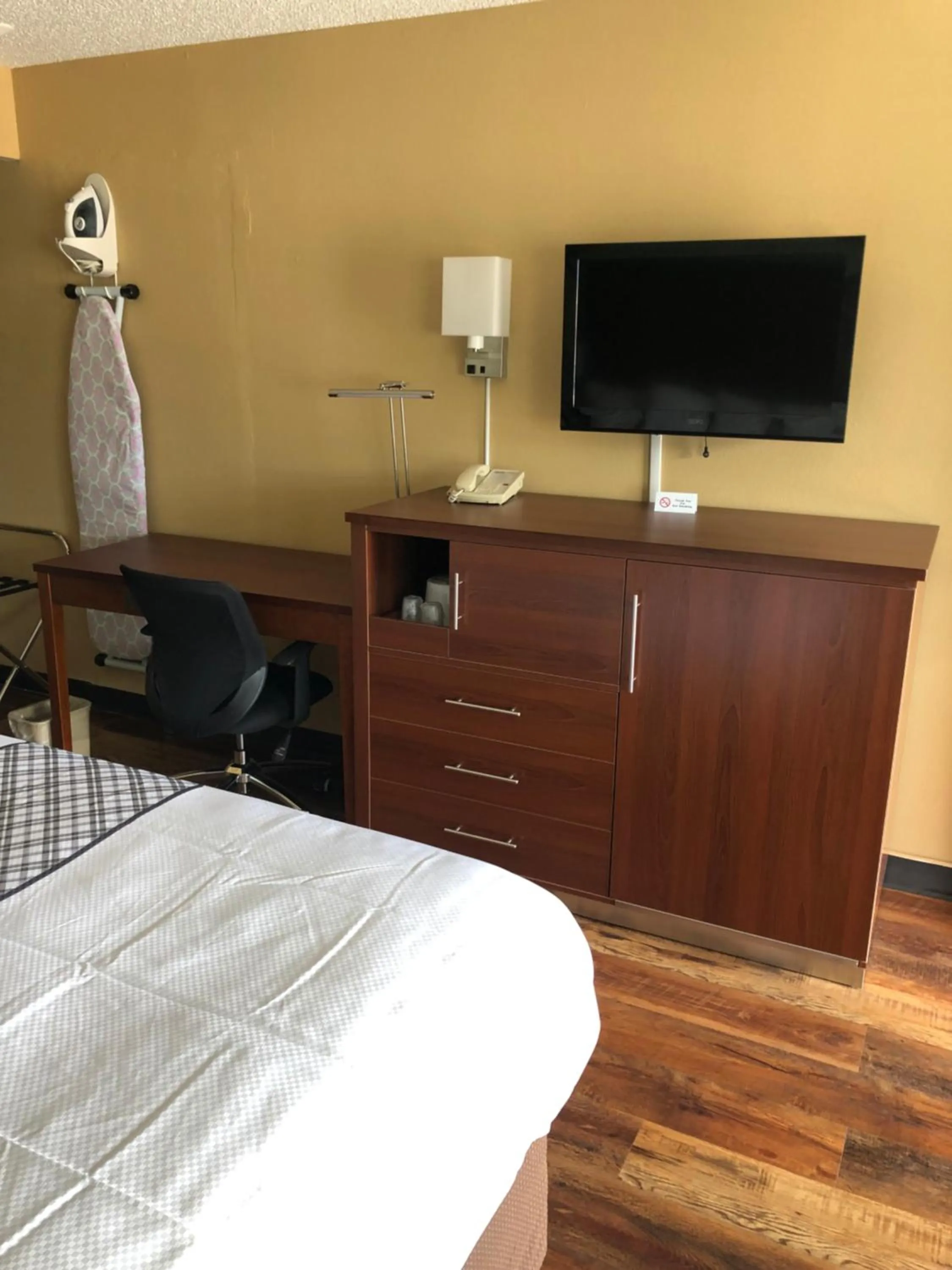 Bed in Knights Inn Motel