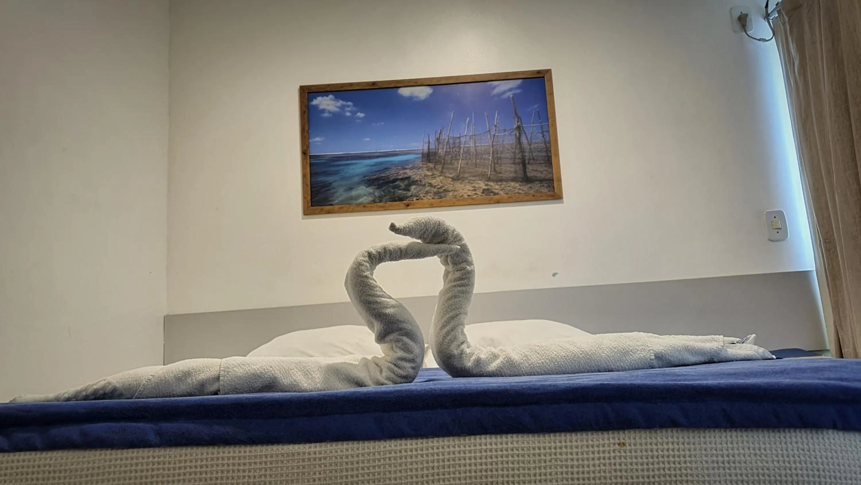 Bed in Bluemar Hotel