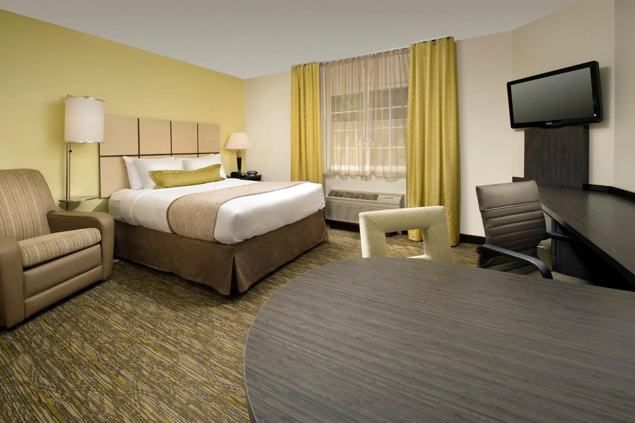 Photo of the whole room, Bed in Candlewood Suites Richmond - South by IHG