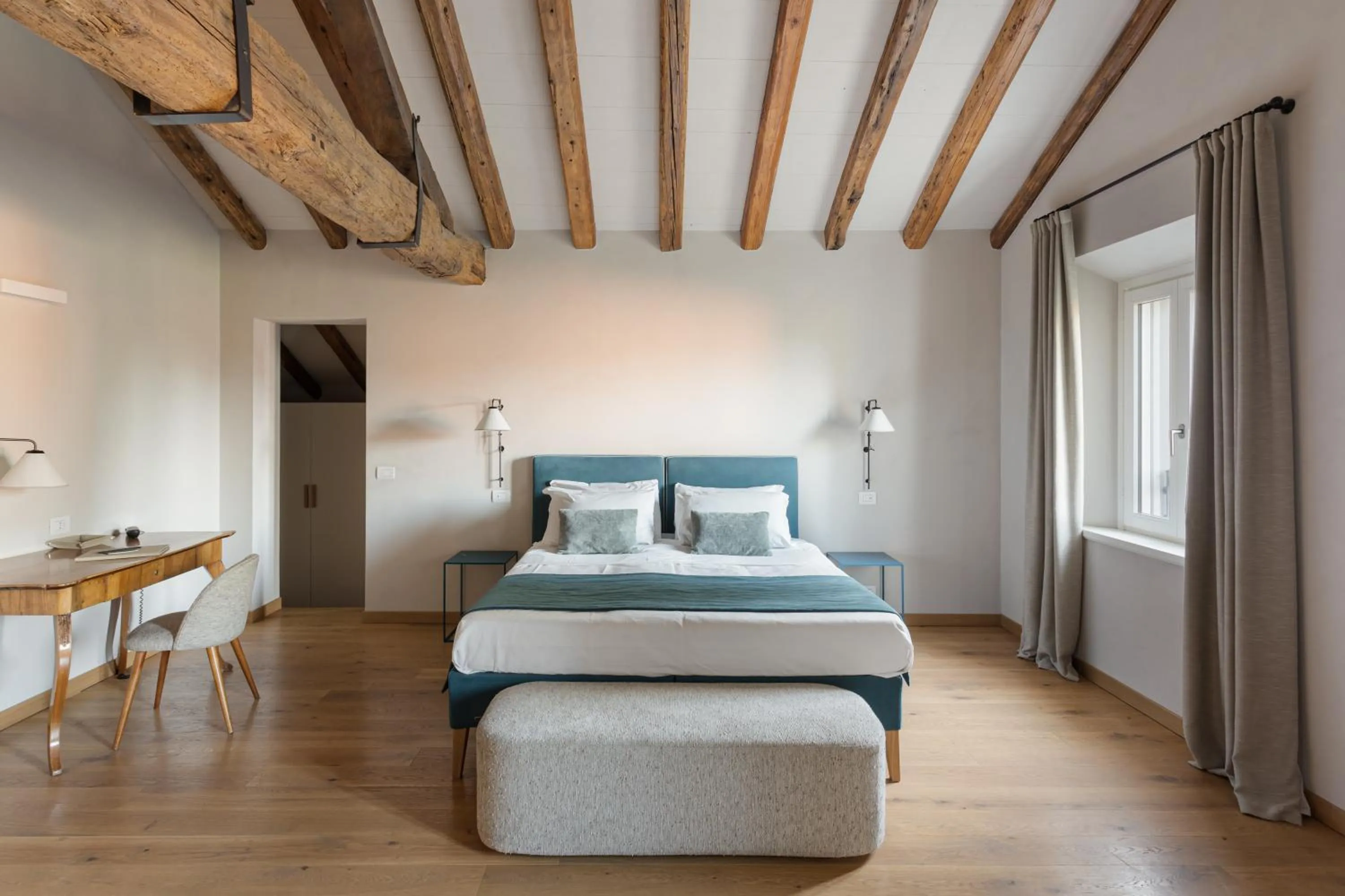 Bed in Relais Roncolo 1888 - Small Luxury Hotels of the World