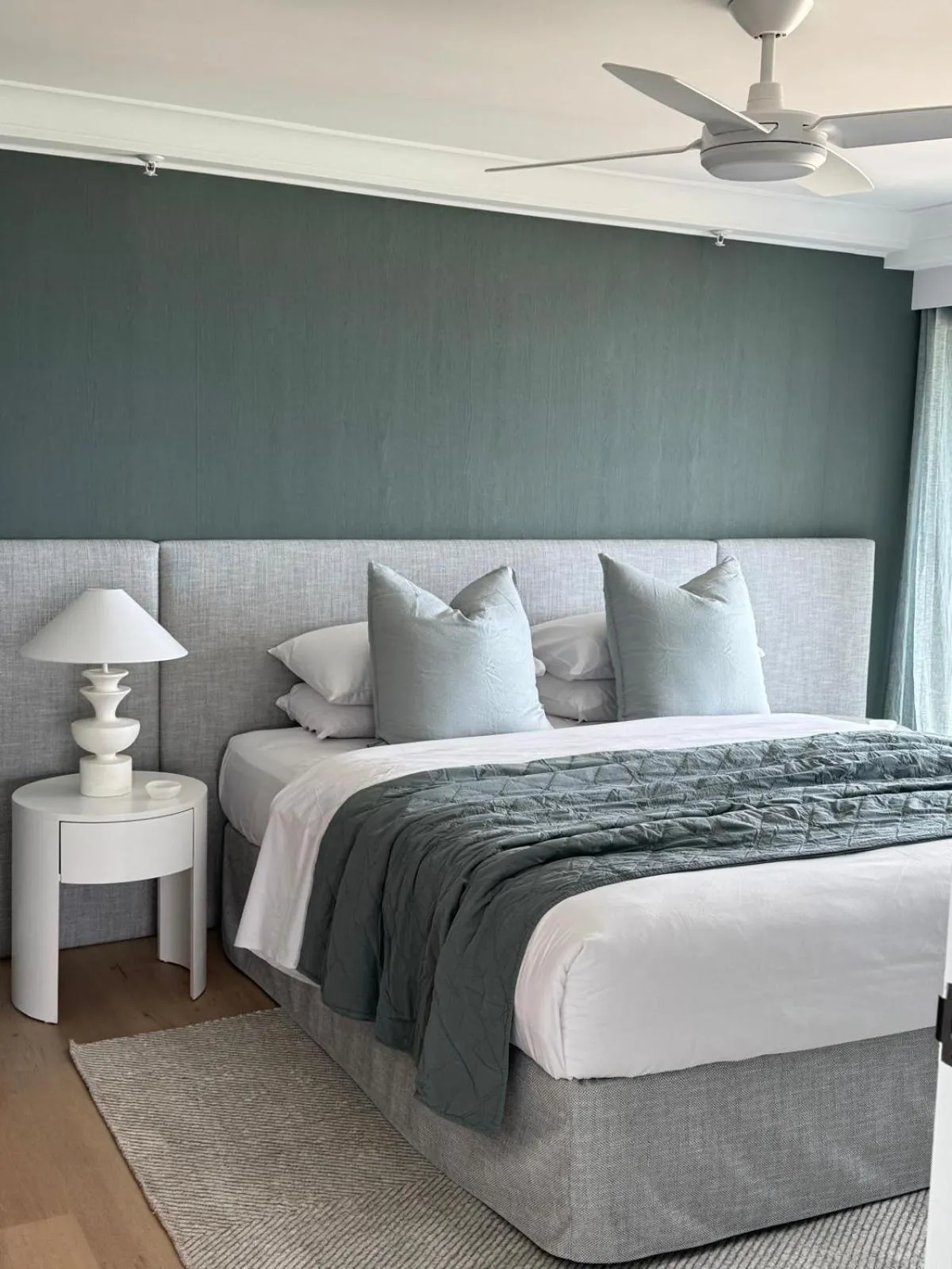 Bed in De Ville Apartments