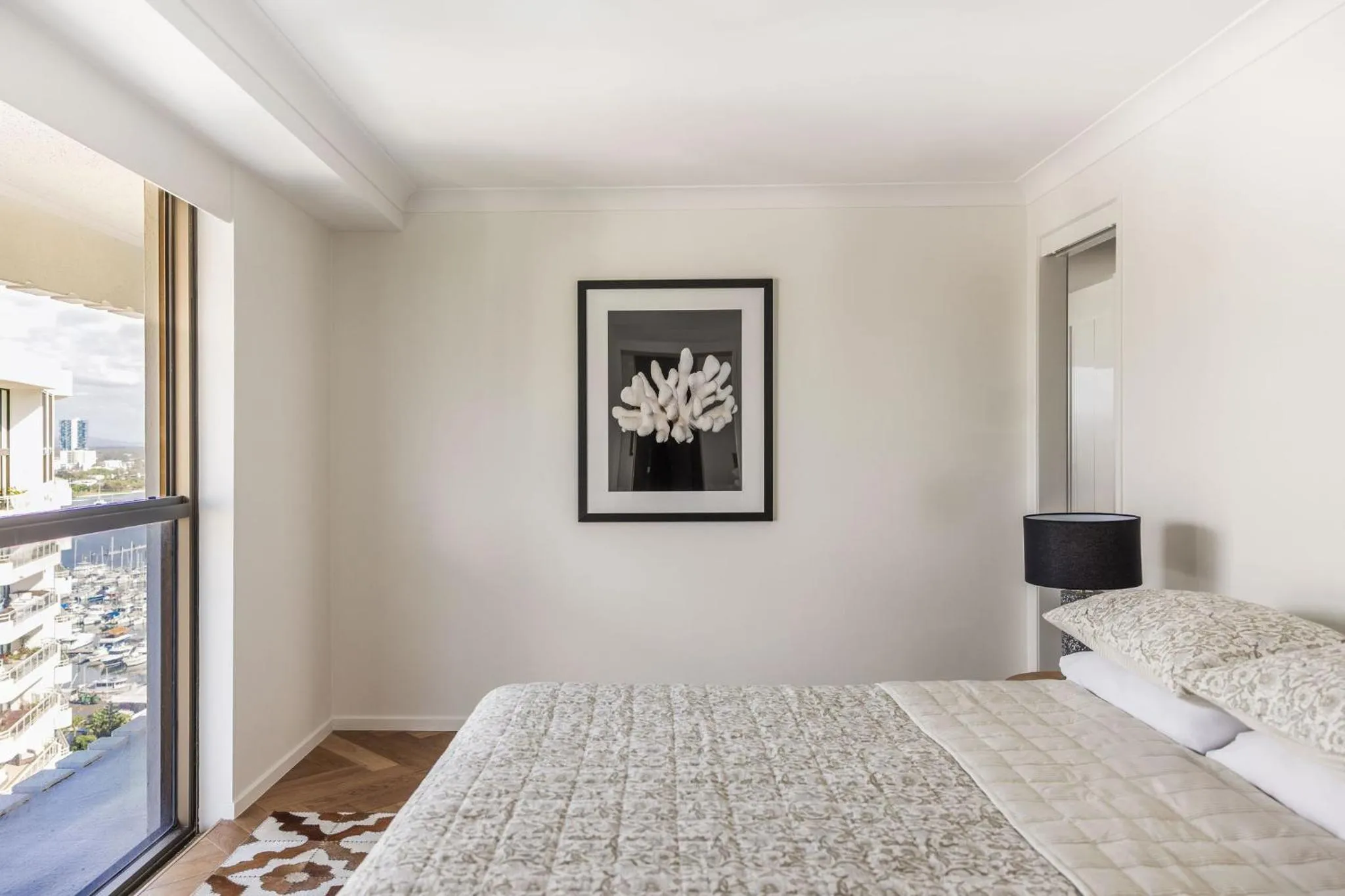 Bed in De Ville Apartments