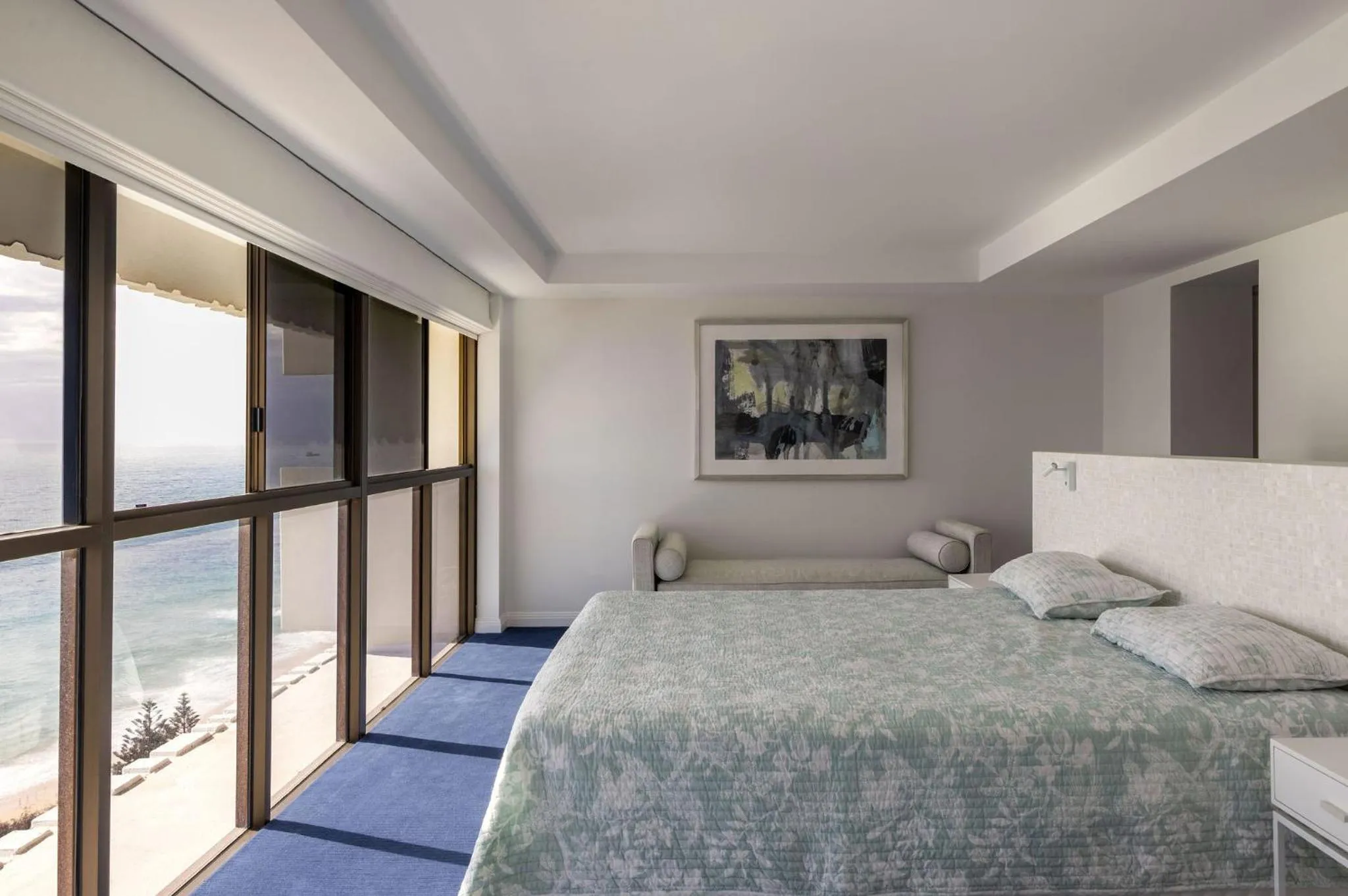 Bed in De Ville Apartments