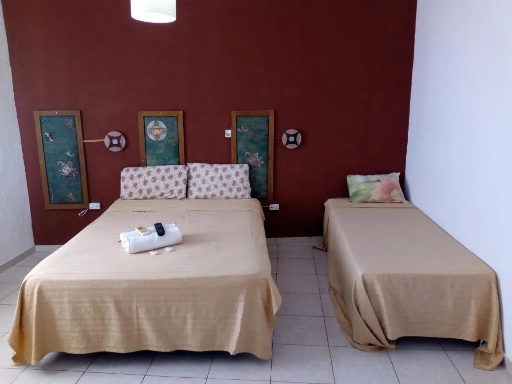 Bed in Petit Hotel Panambi