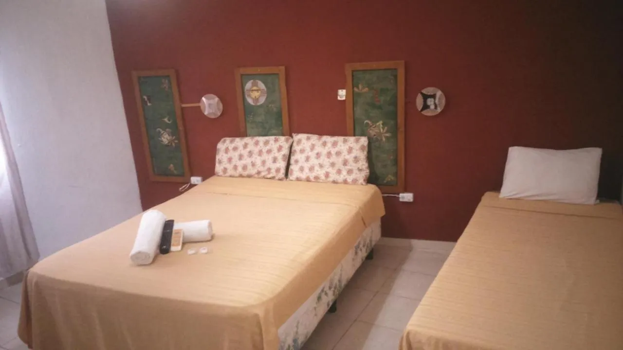 Bed in Petit Hotel Panambi