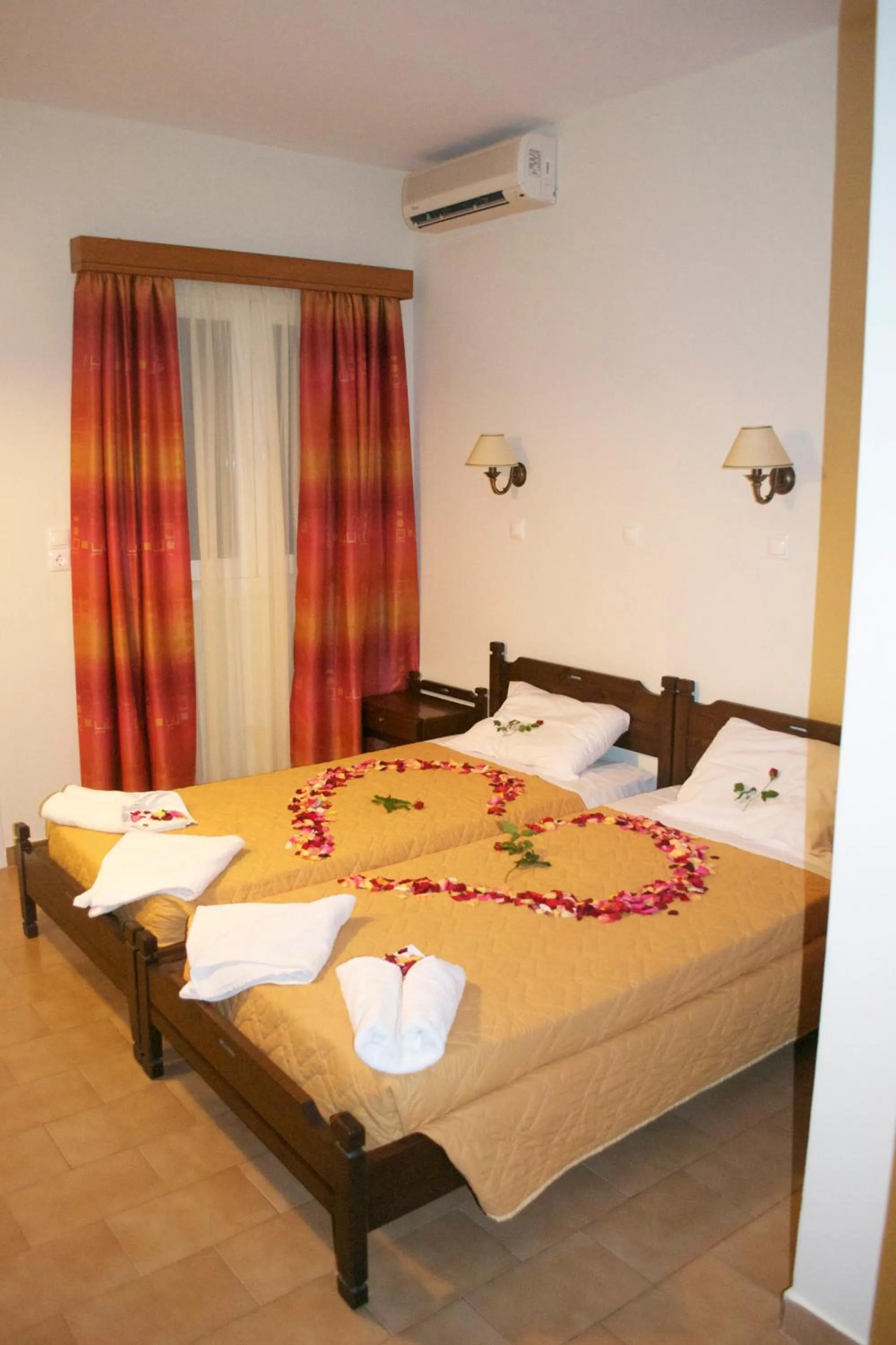 Bed in Ampavris Family Apartments