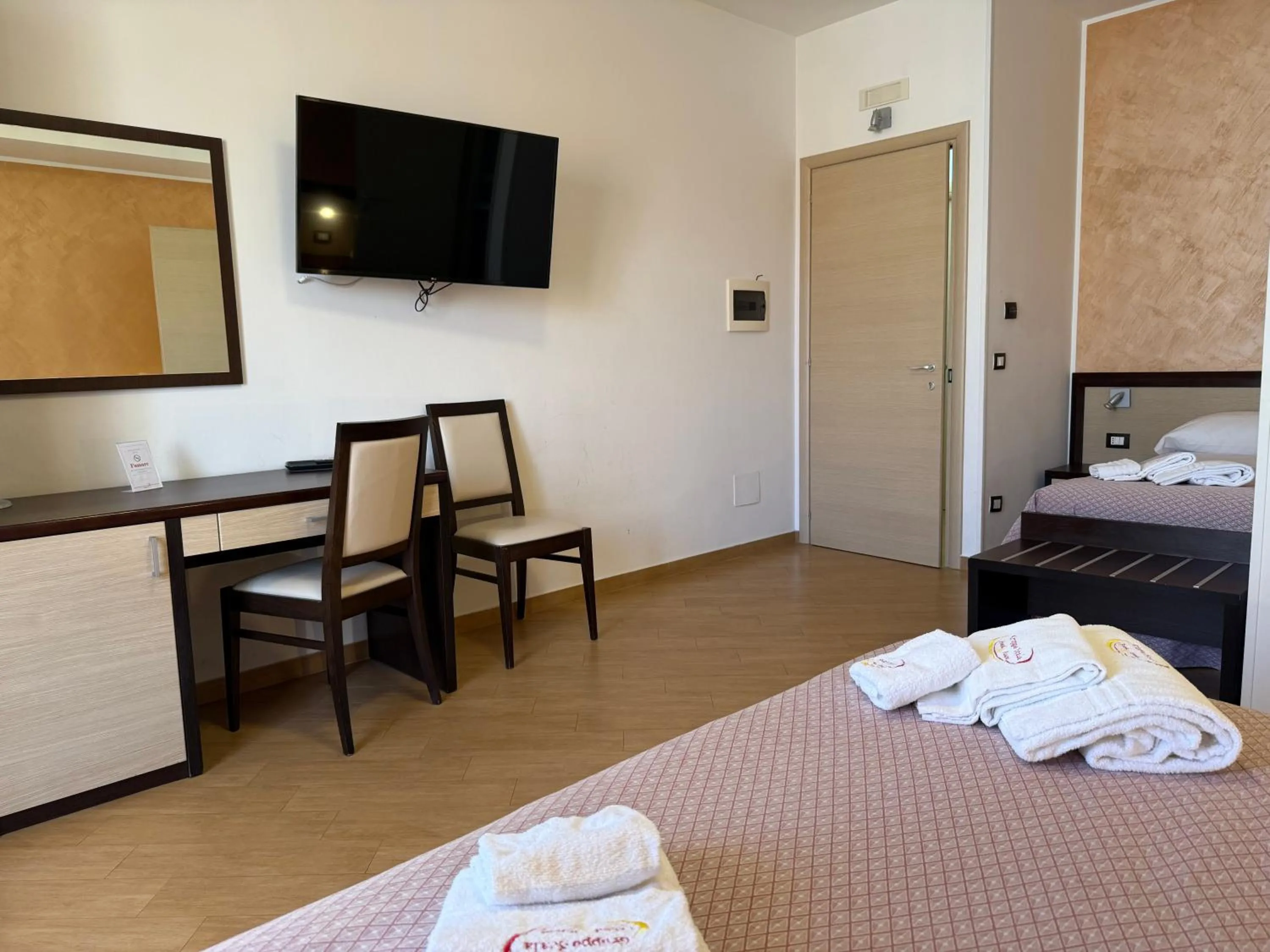 Bed in Albergo Perseo