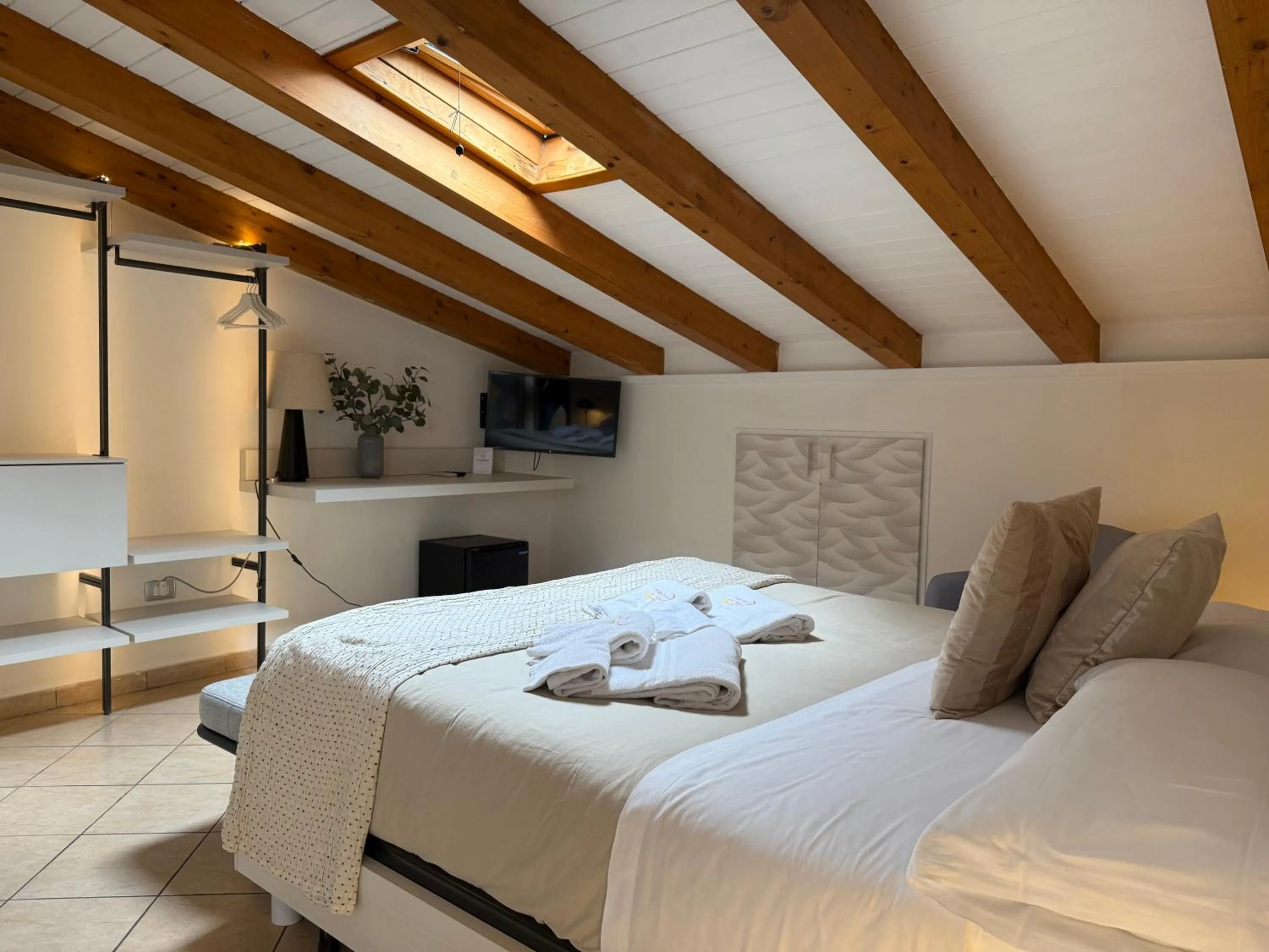 Bed in Albergo Perseo