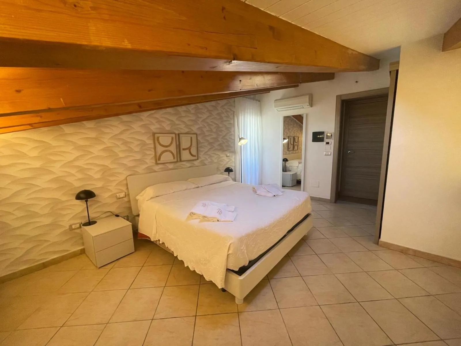 Bed in Albergo Perseo