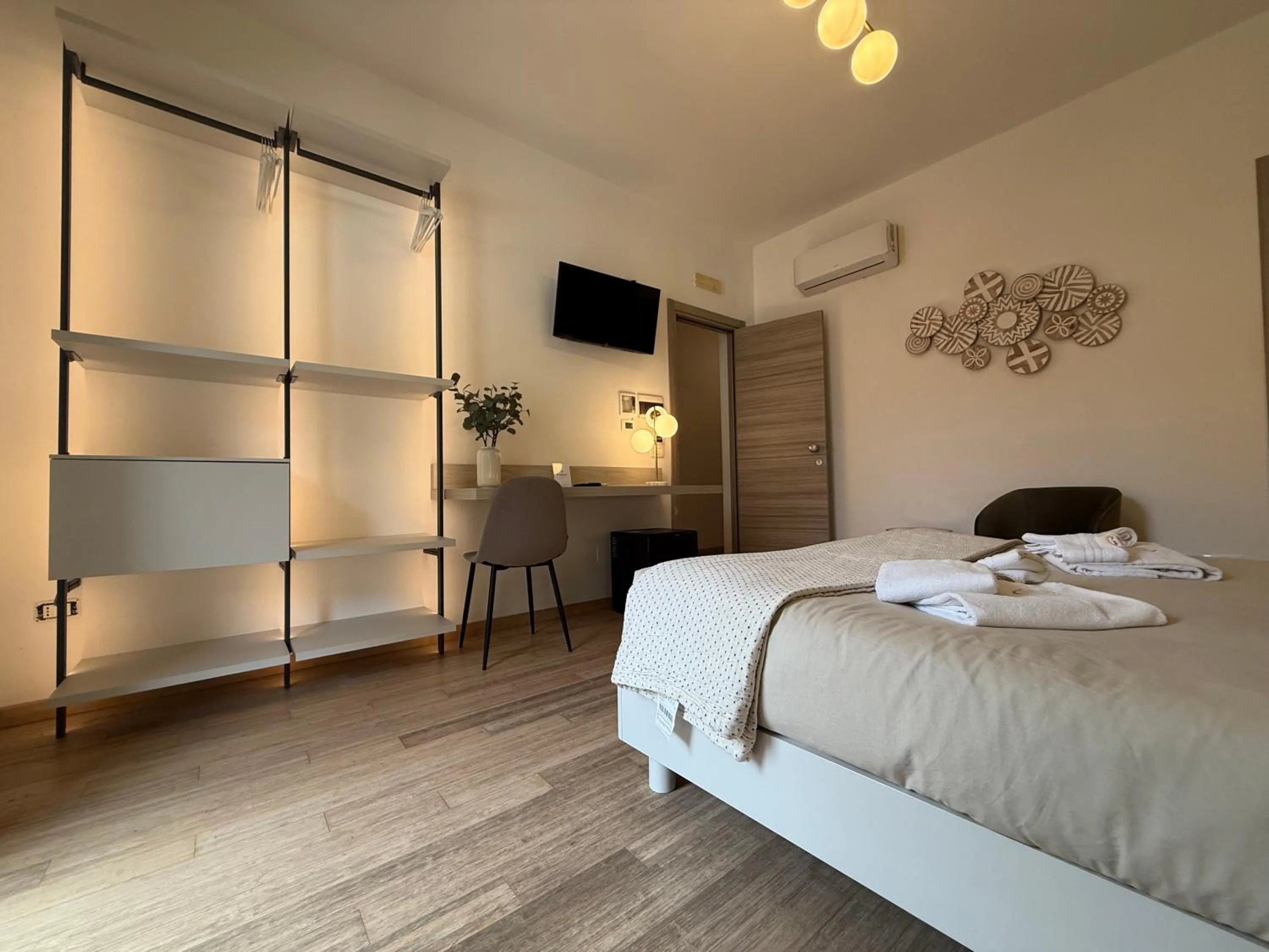 Bed in Albergo Perseo