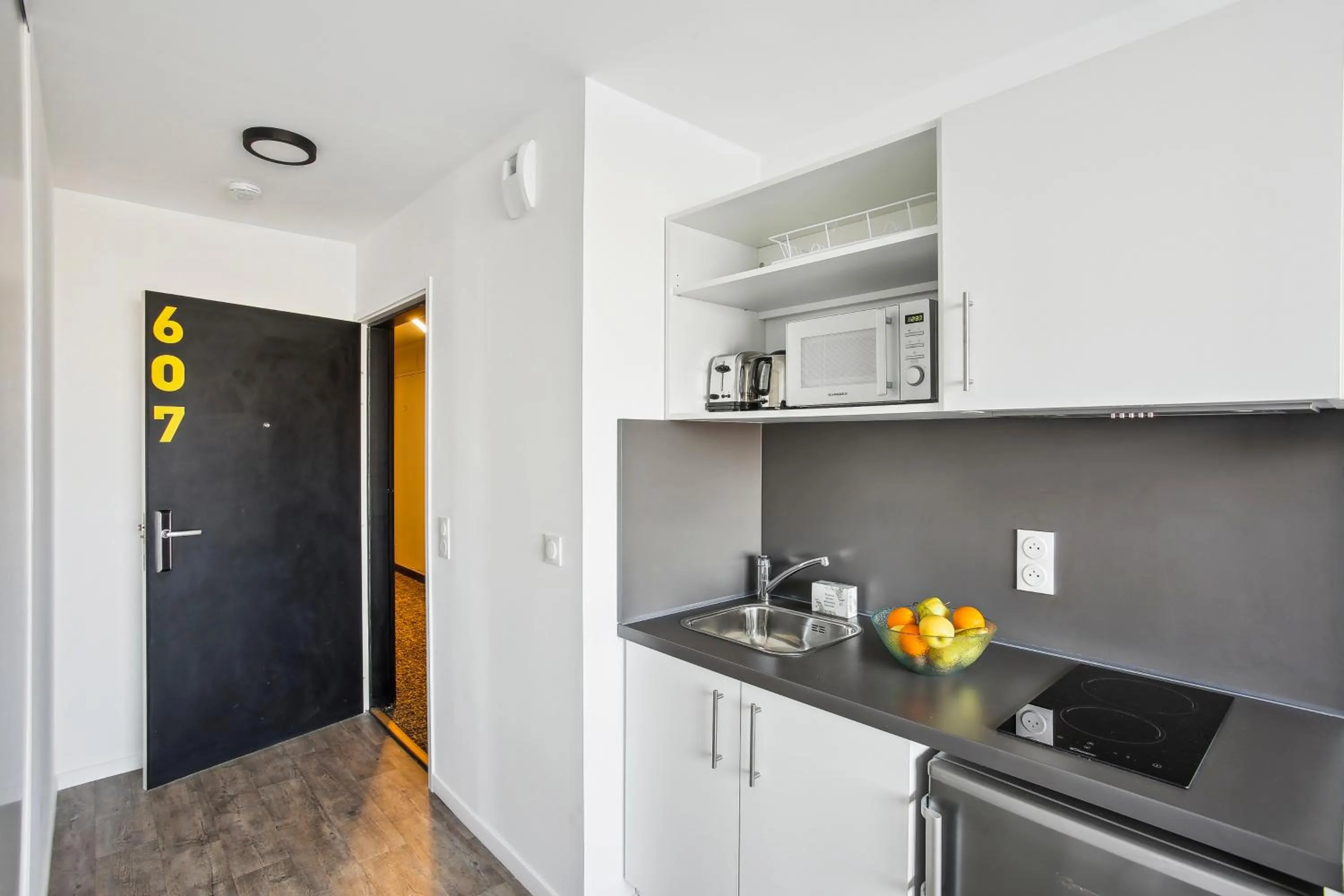 Kitchen or kitchenette in All Suites Appart Hôtel - Dunkerque Centre