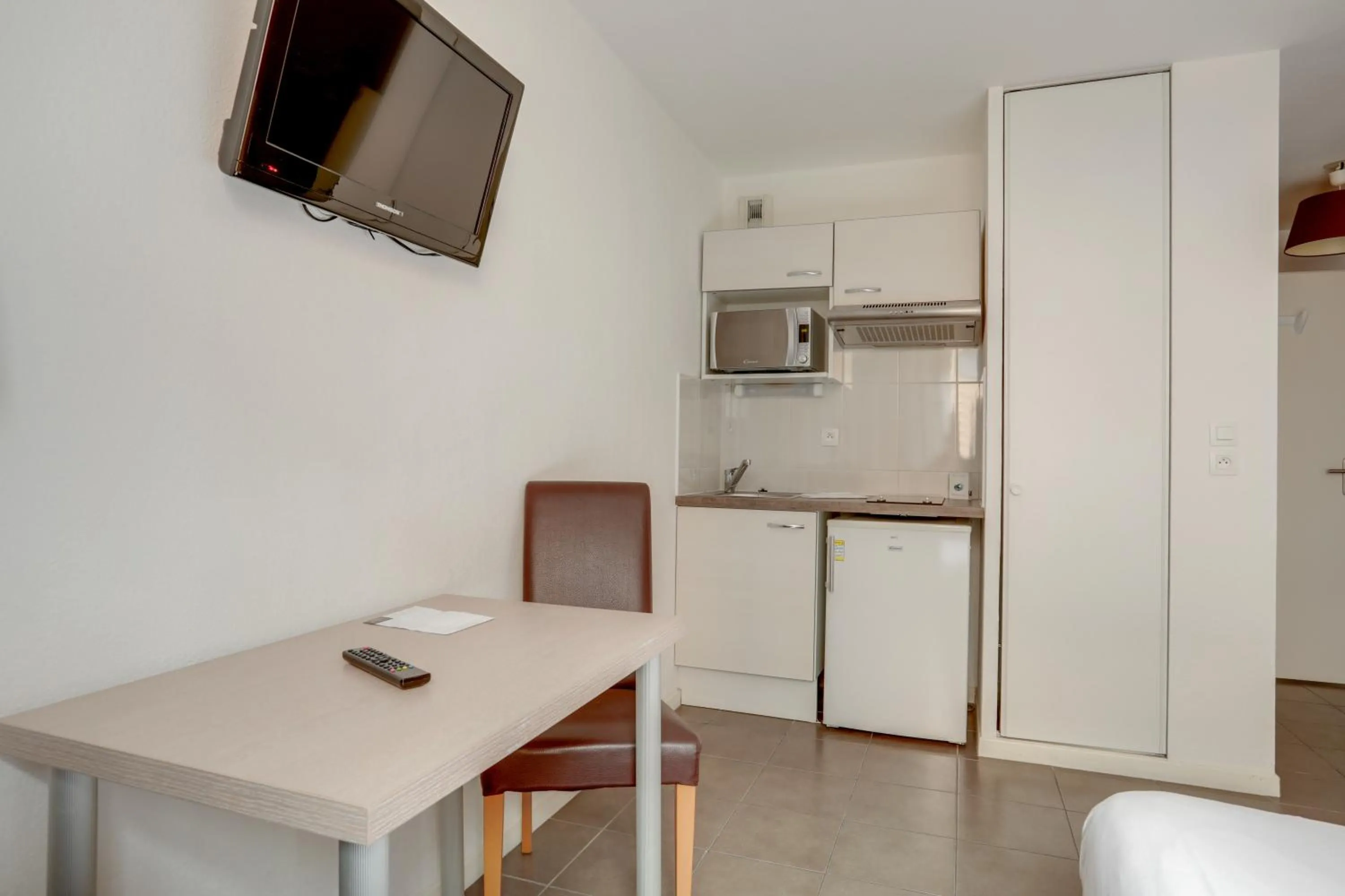 TV and multimedia in All Suites Appart Hôtel - Dunkerque Centre