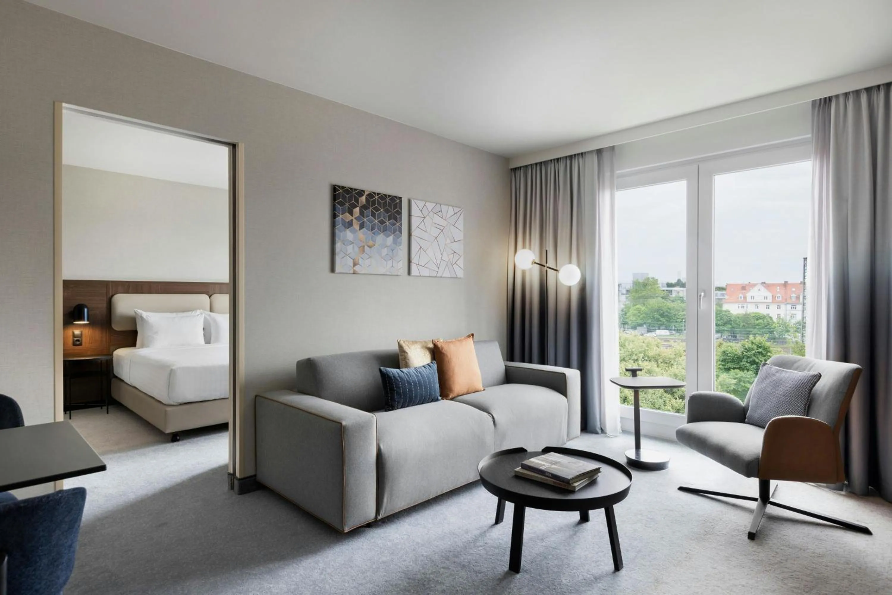 Living room, Bed in Courtyard by Marriott Munich City East