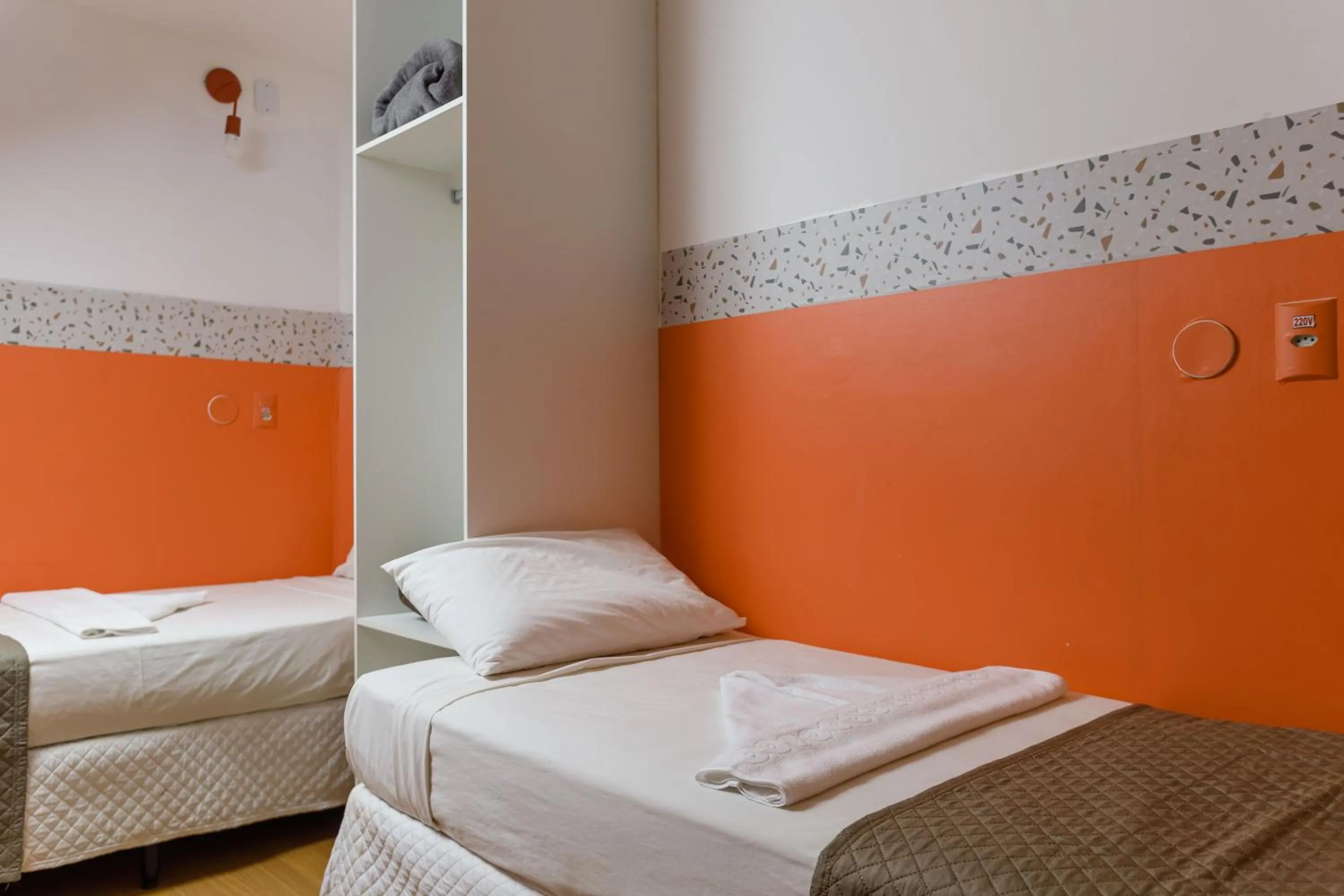 Bed in Zuza Slim Suítes