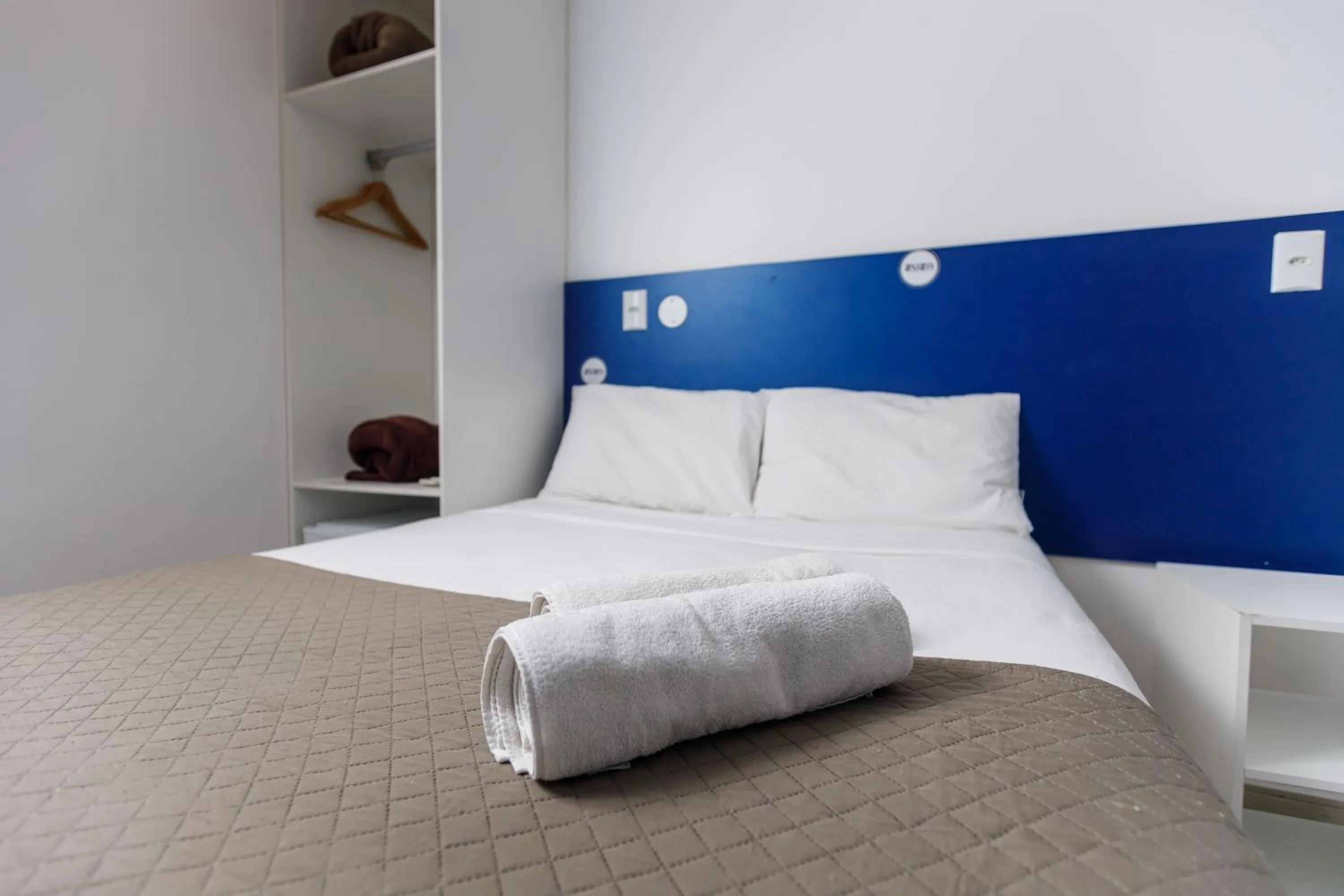 Bed in Zuza Slim Suítes