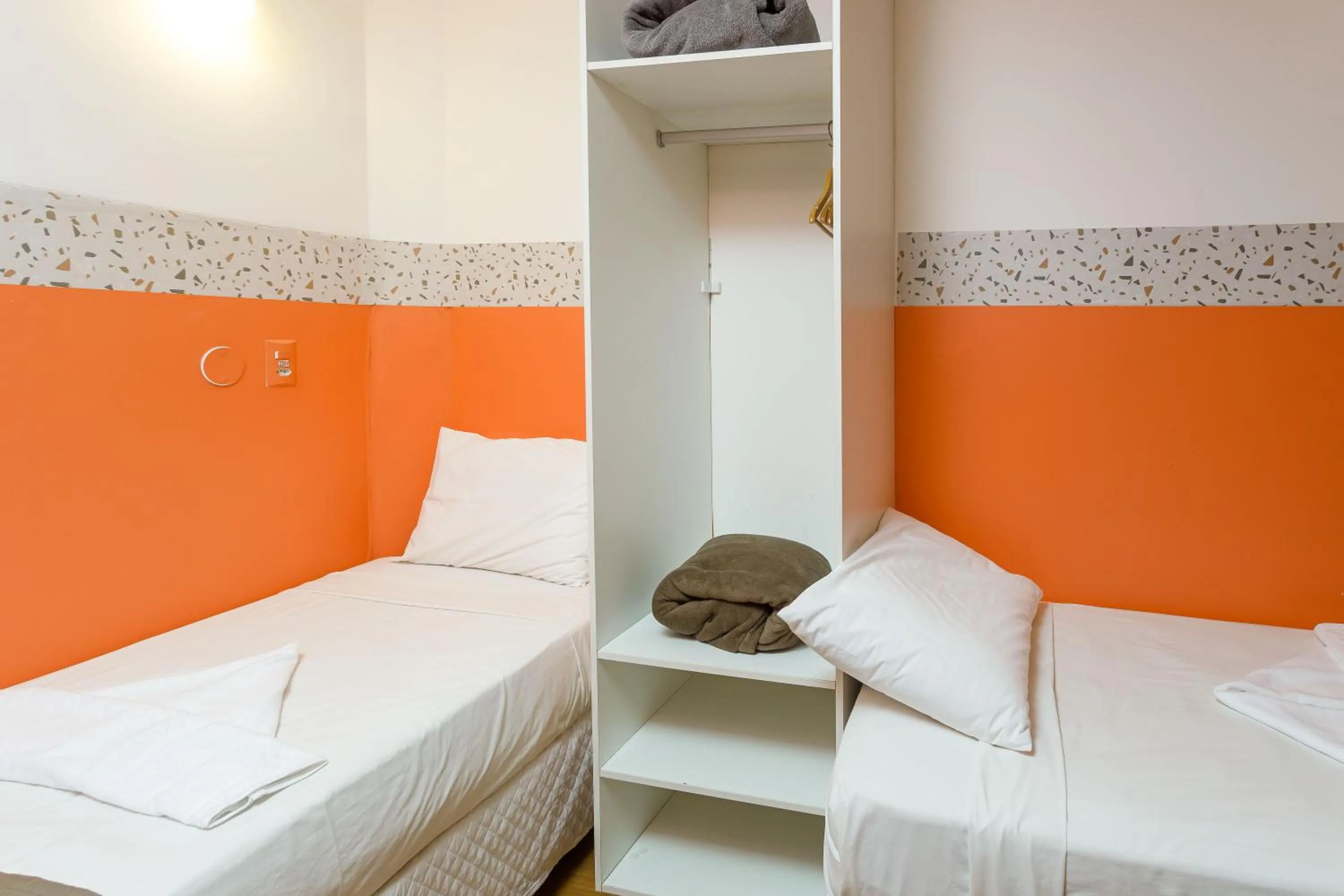 Bed in Zuza Slim Suítes