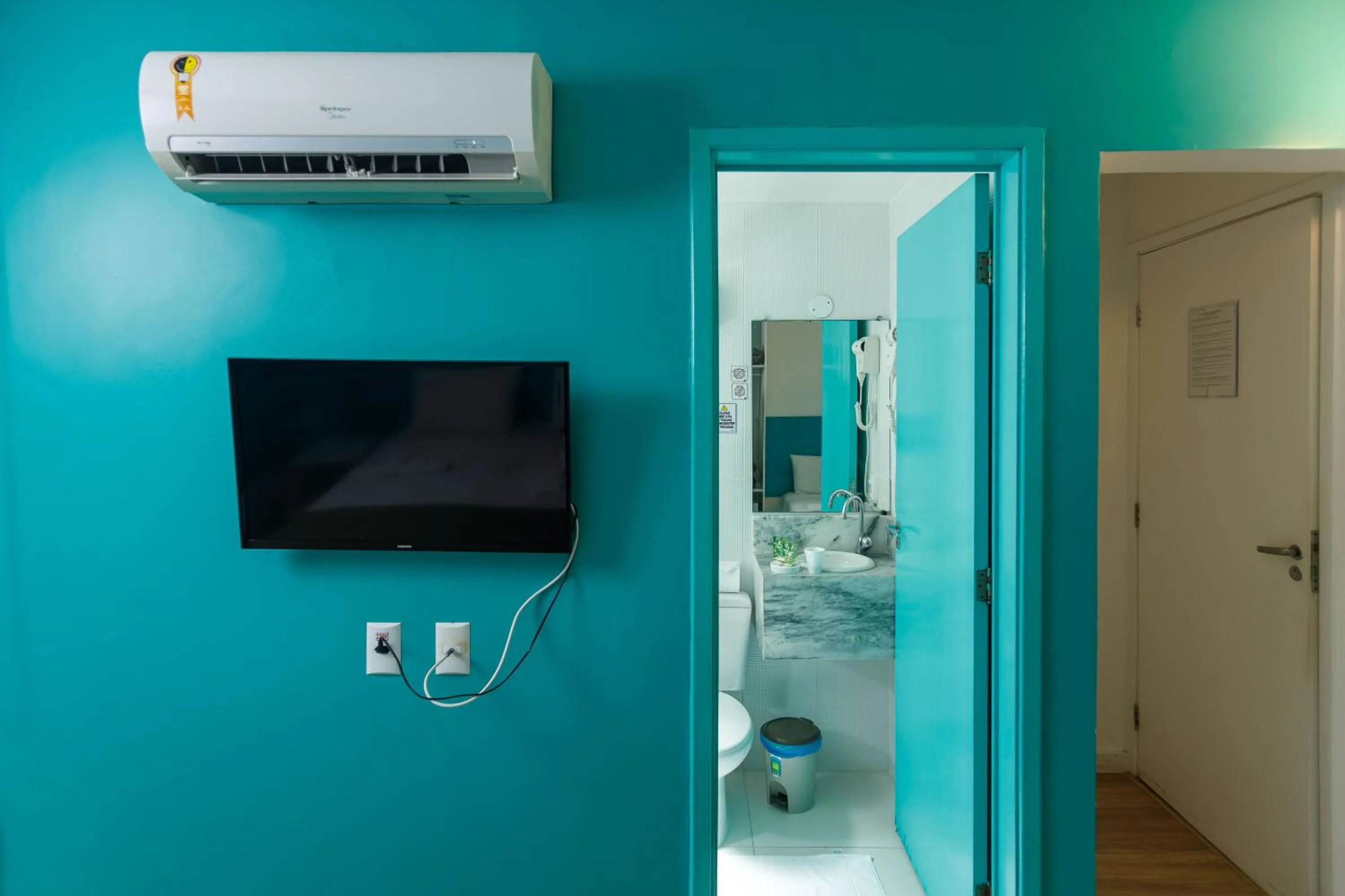 Bathroom in Zuza Slim Suítes