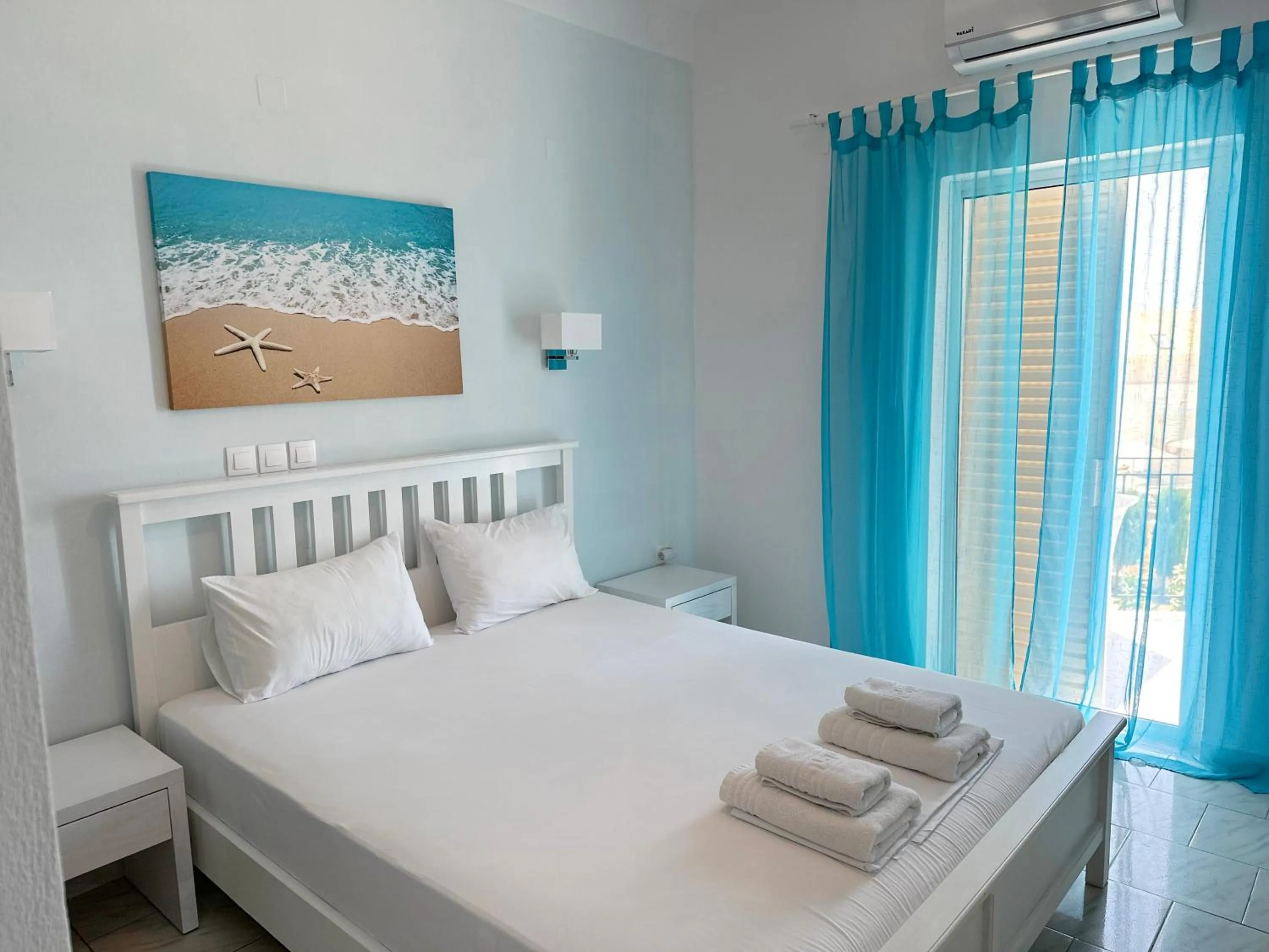 Bed in Mirto Beach Hotel & Restaurant