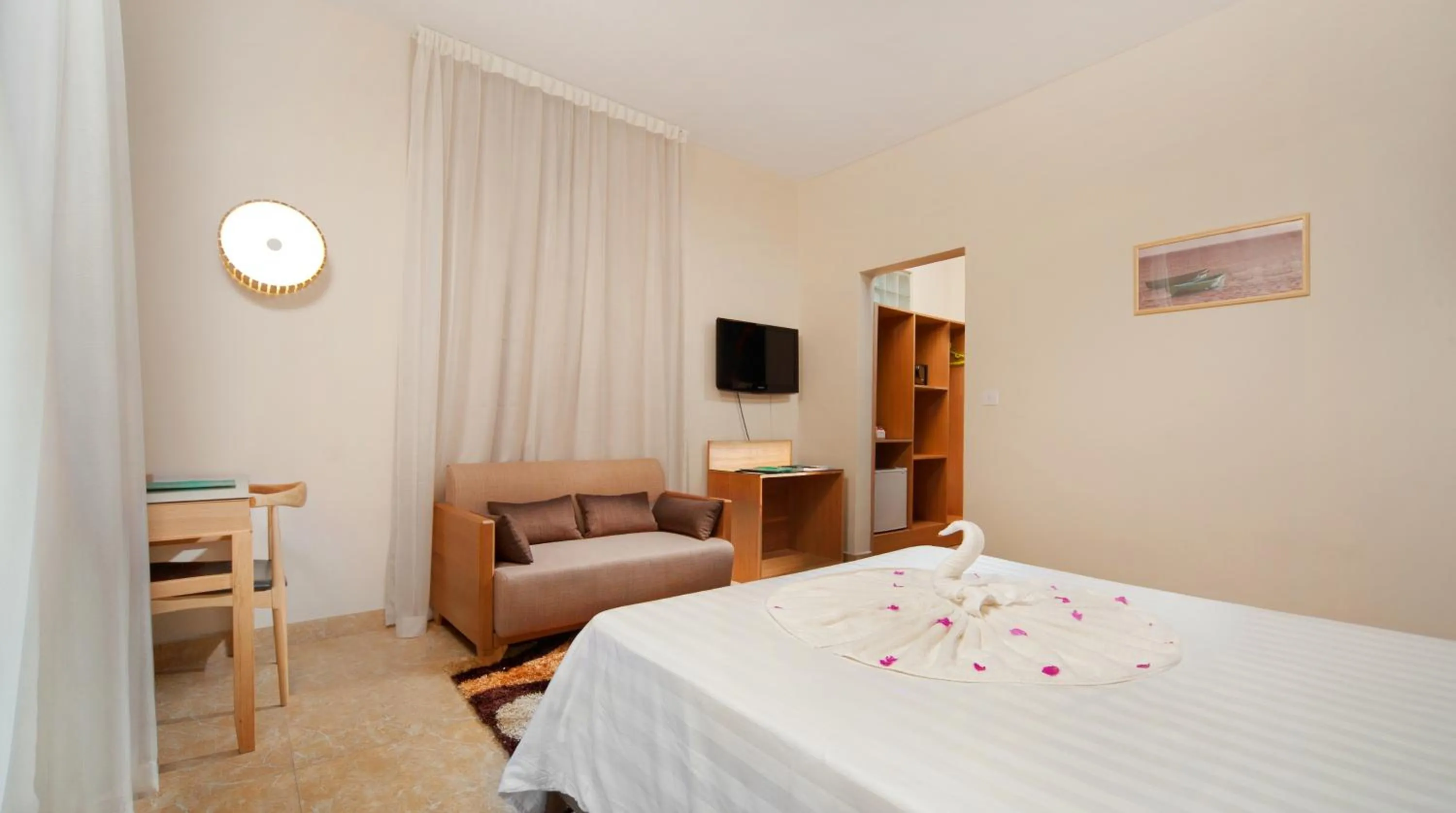 Bedroom, Bed in Le Palmiste Resort & Spa