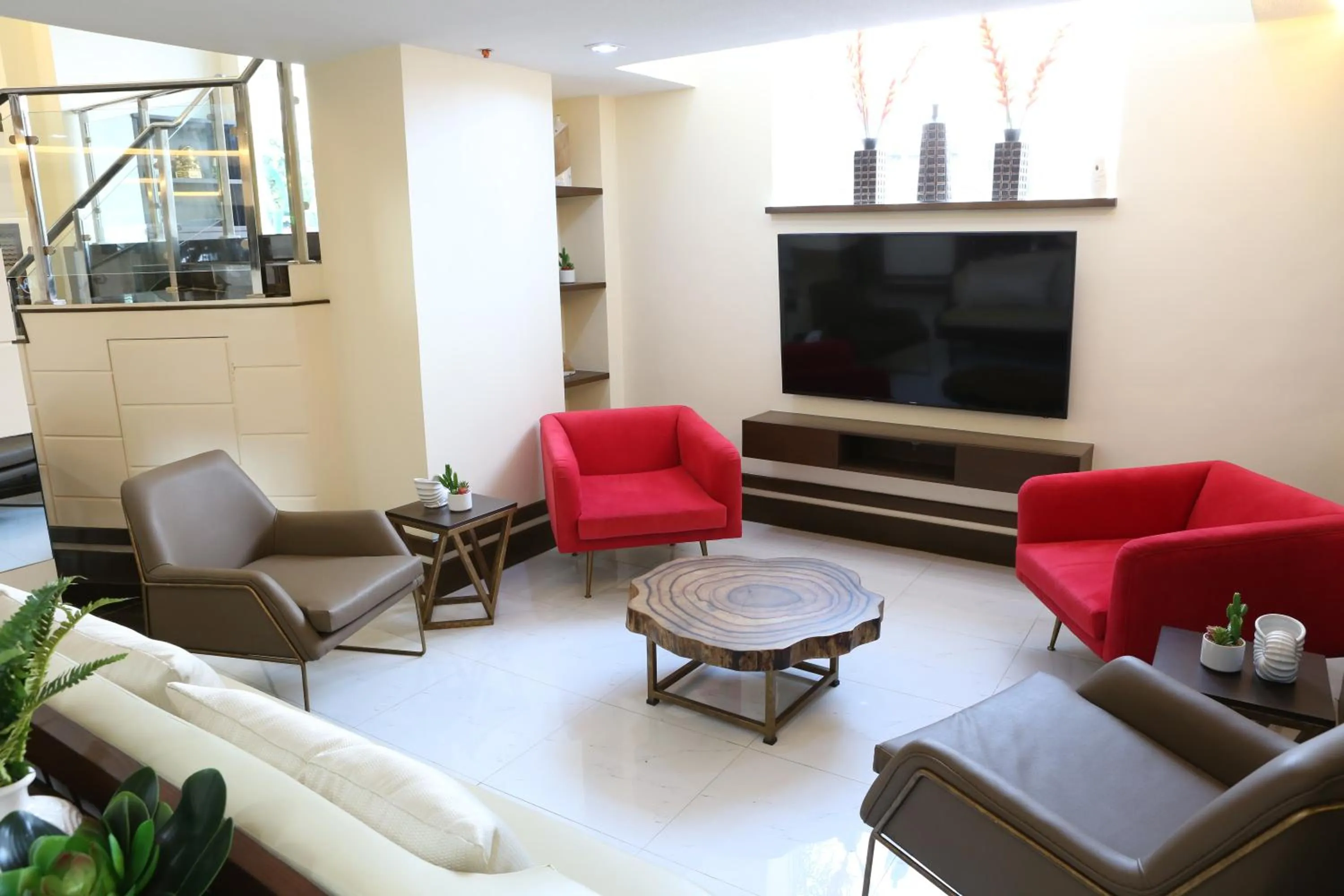 Seating area in Achievers Airport Hotel