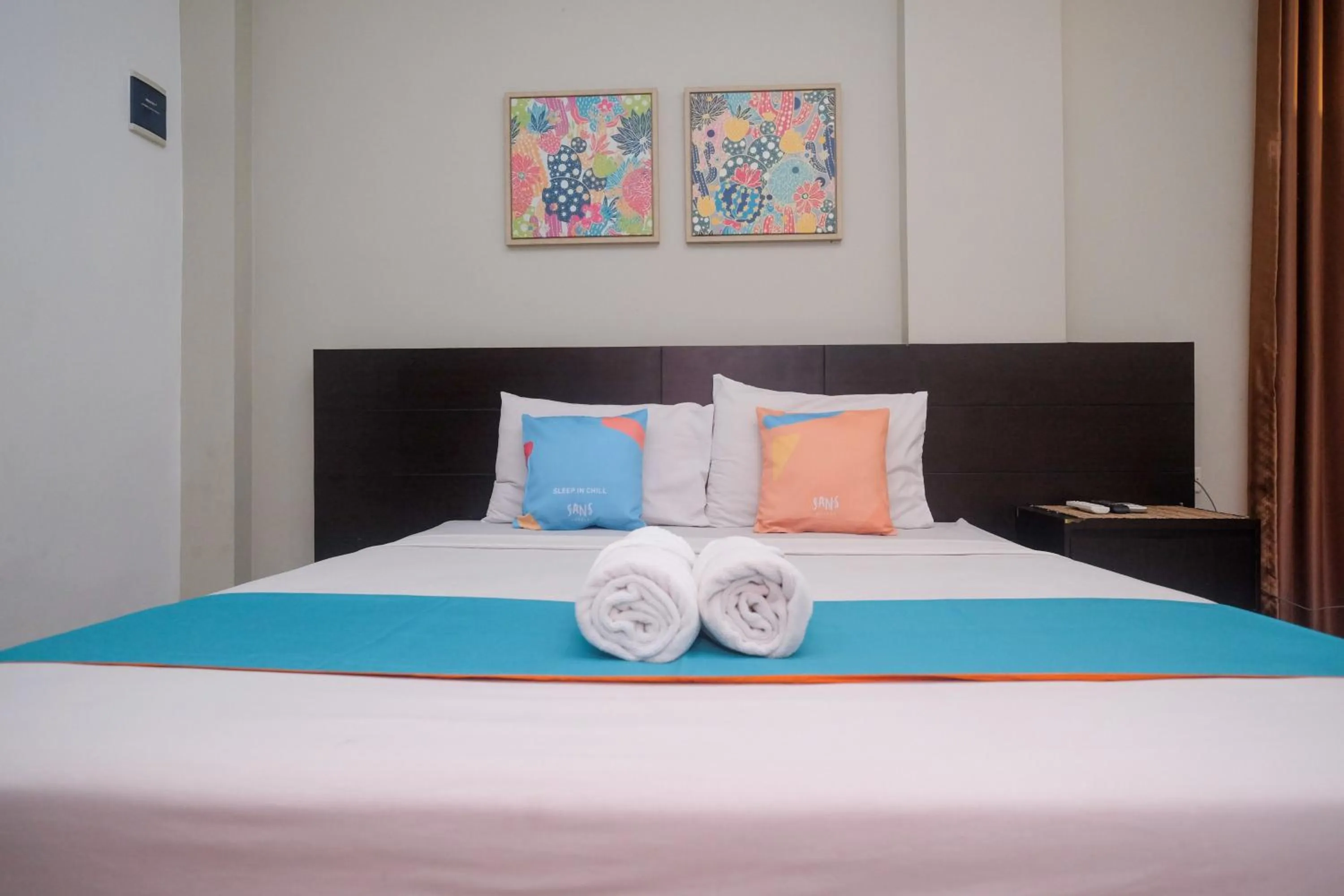 Bedroom, Bed in Sans Hotel Prime Cailendra Yogyakarta by RedDoorz