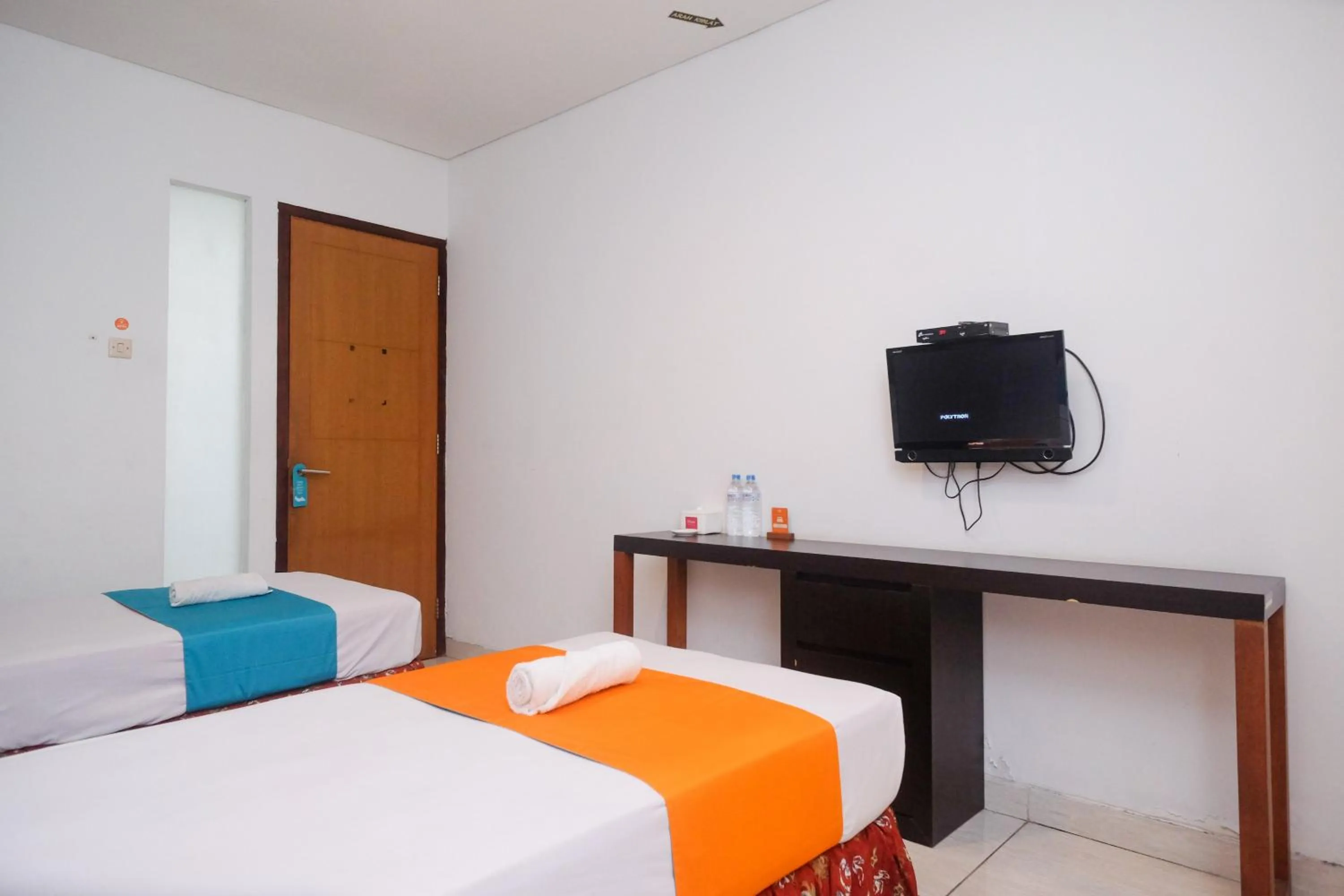 Bedroom, Bed in Sans Hotel Prime Cailendra Yogyakarta by RedDoorz
