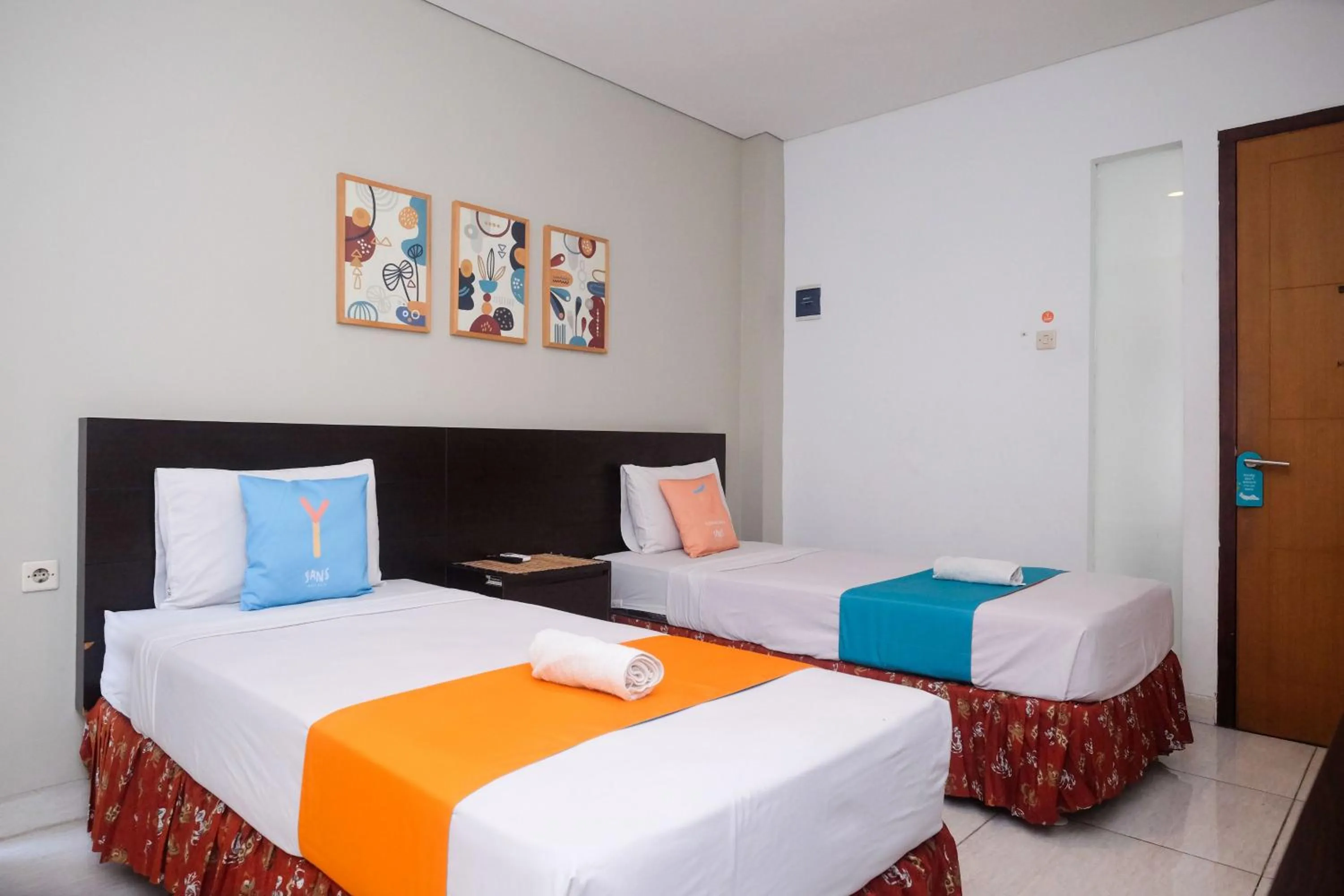 Bedroom, Bed in Sans Hotel Prime Cailendra Yogyakarta by RedDoorz