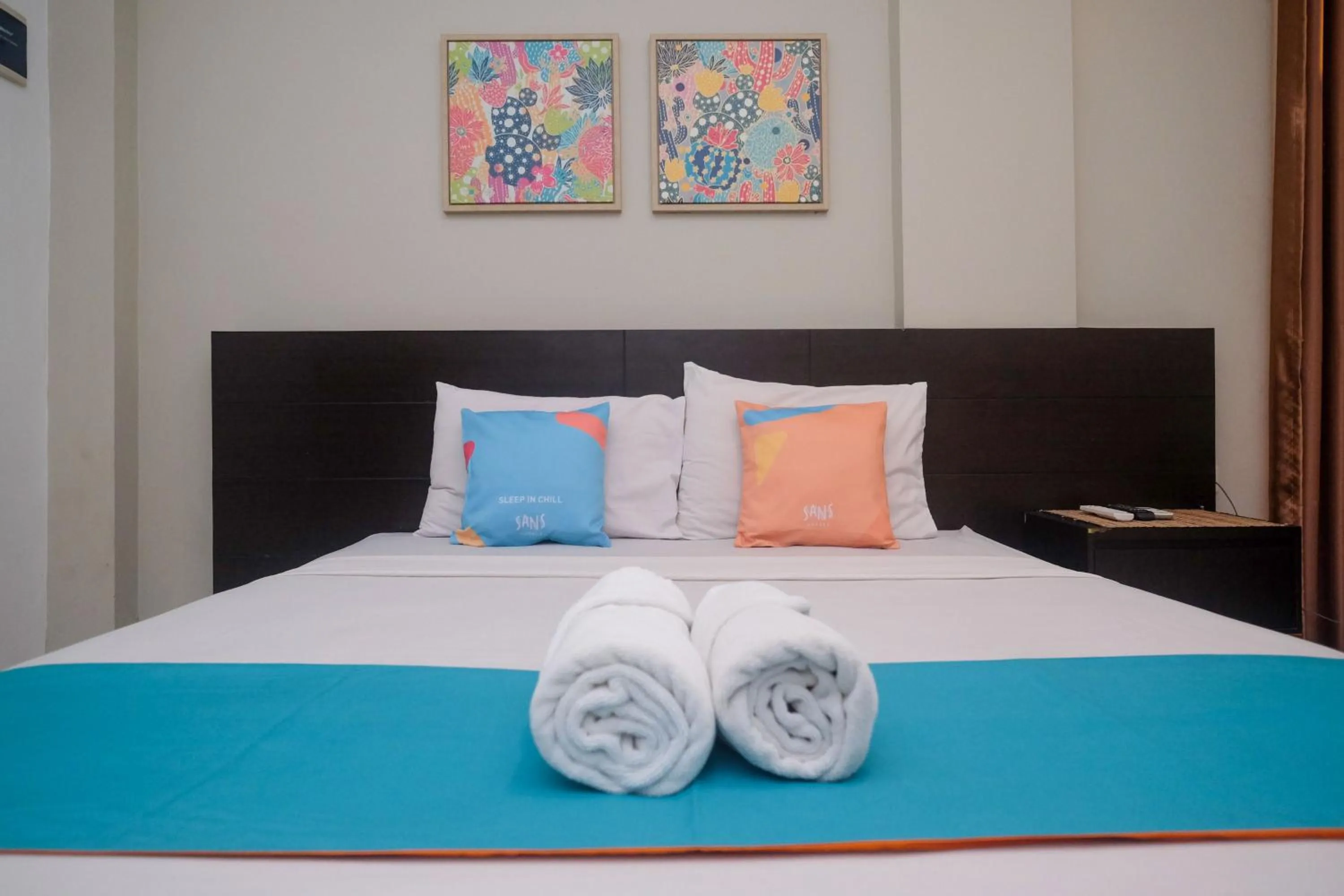 Bedroom, Bed in Sans Hotel Prime Cailendra Yogyakarta by RedDoorz
