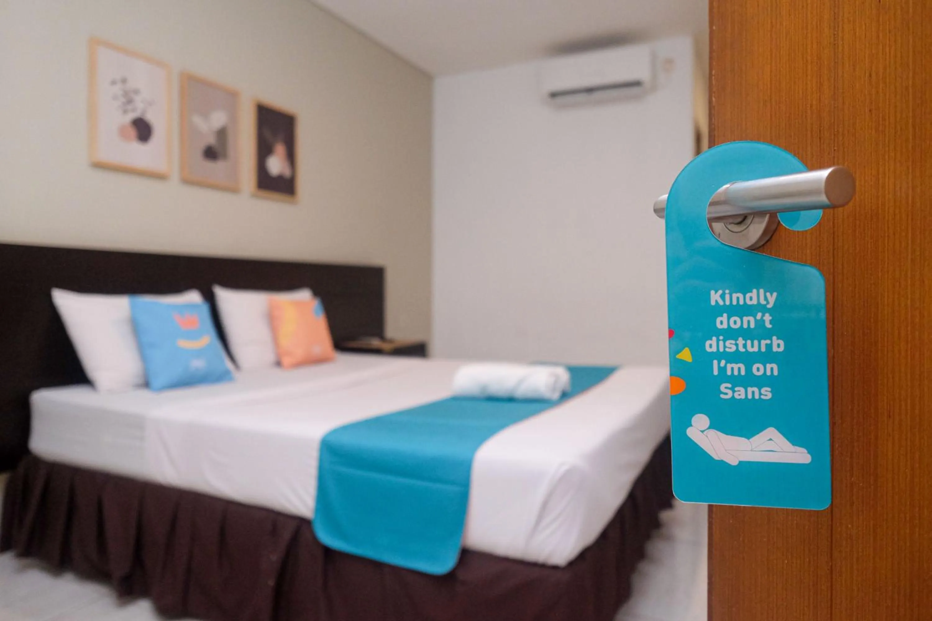 Bedroom, Bed in Sans Hotel Prime Cailendra Yogyakarta by RedDoorz