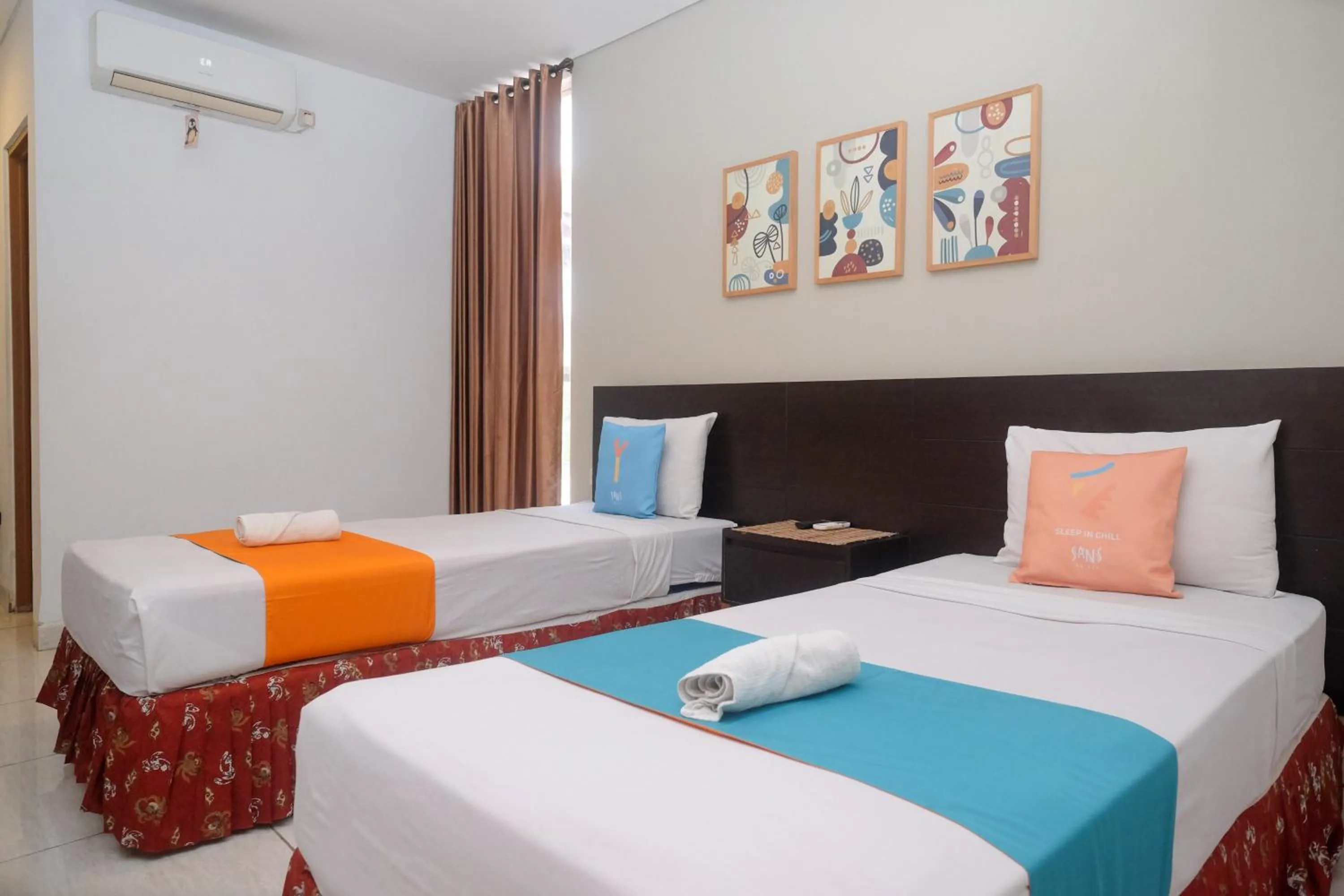 Bedroom, Bed in Sans Hotel Prime Cailendra Yogyakarta by RedDoorz