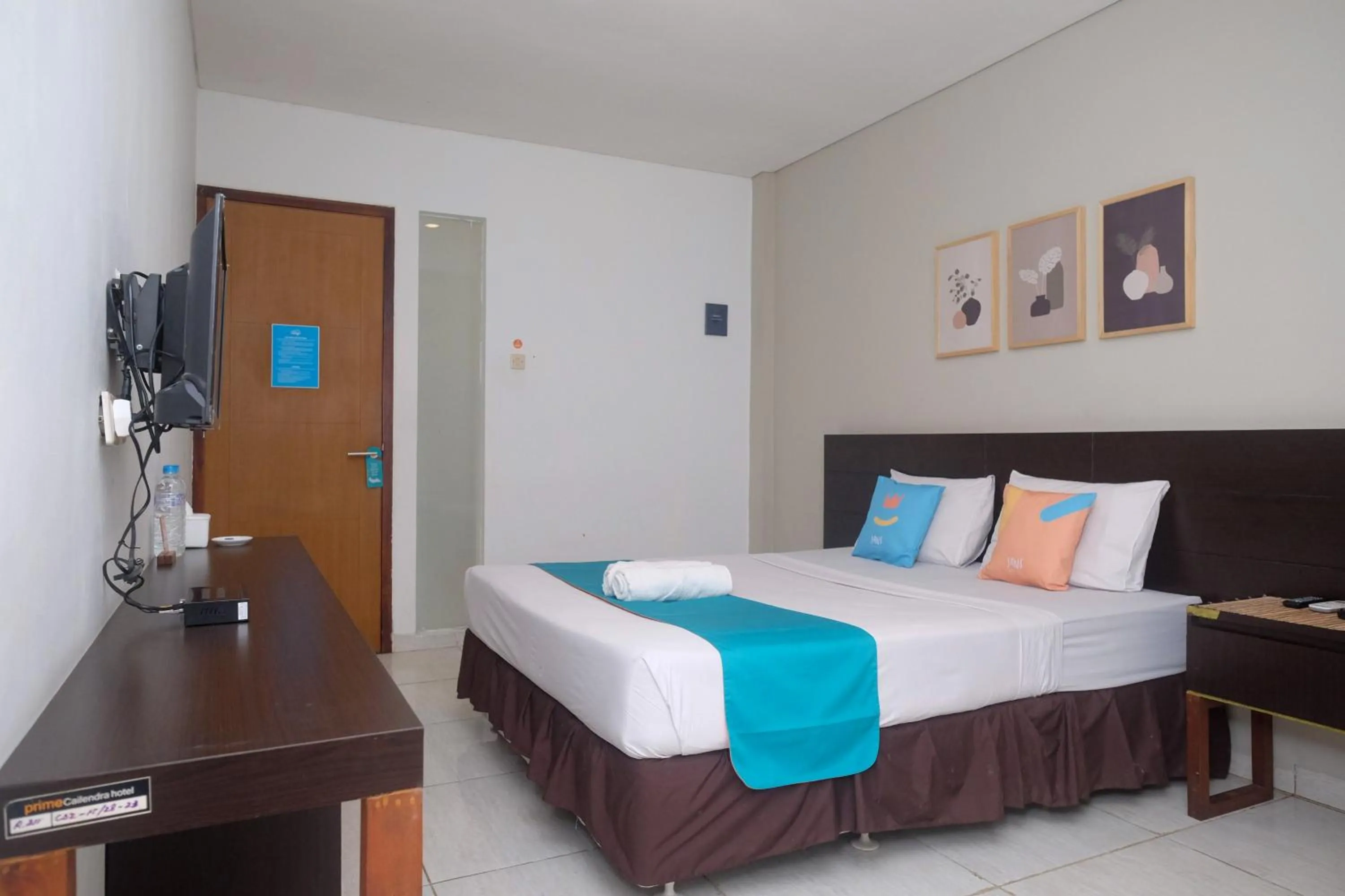 Bedroom, Bed in Sans Hotel Prime Cailendra Yogyakarta by RedDoorz