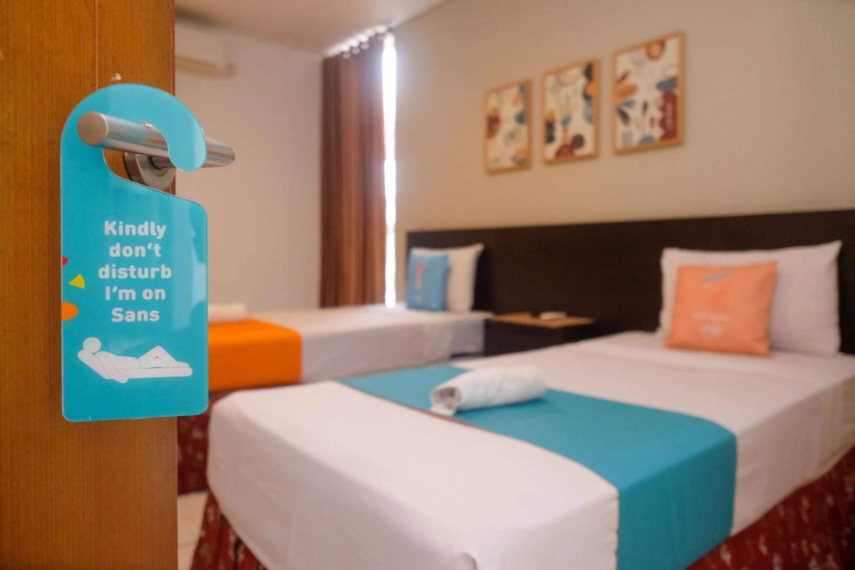 Bedroom, Bed in Sans Hotel Prime Cailendra Yogyakarta by RedDoorz