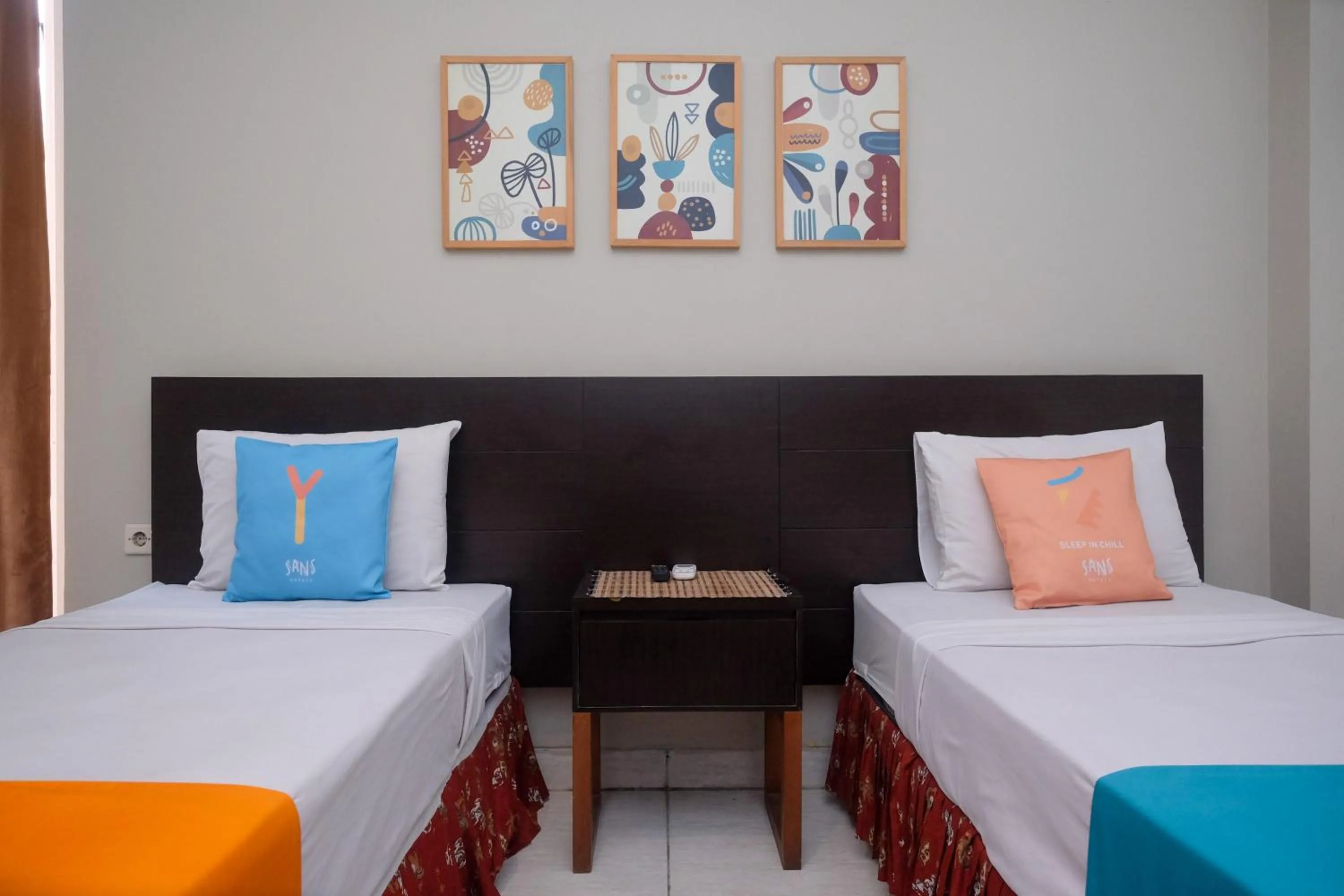 Bedroom, Bed in Sans Hotel Prime Cailendra Yogyakarta by RedDoorz