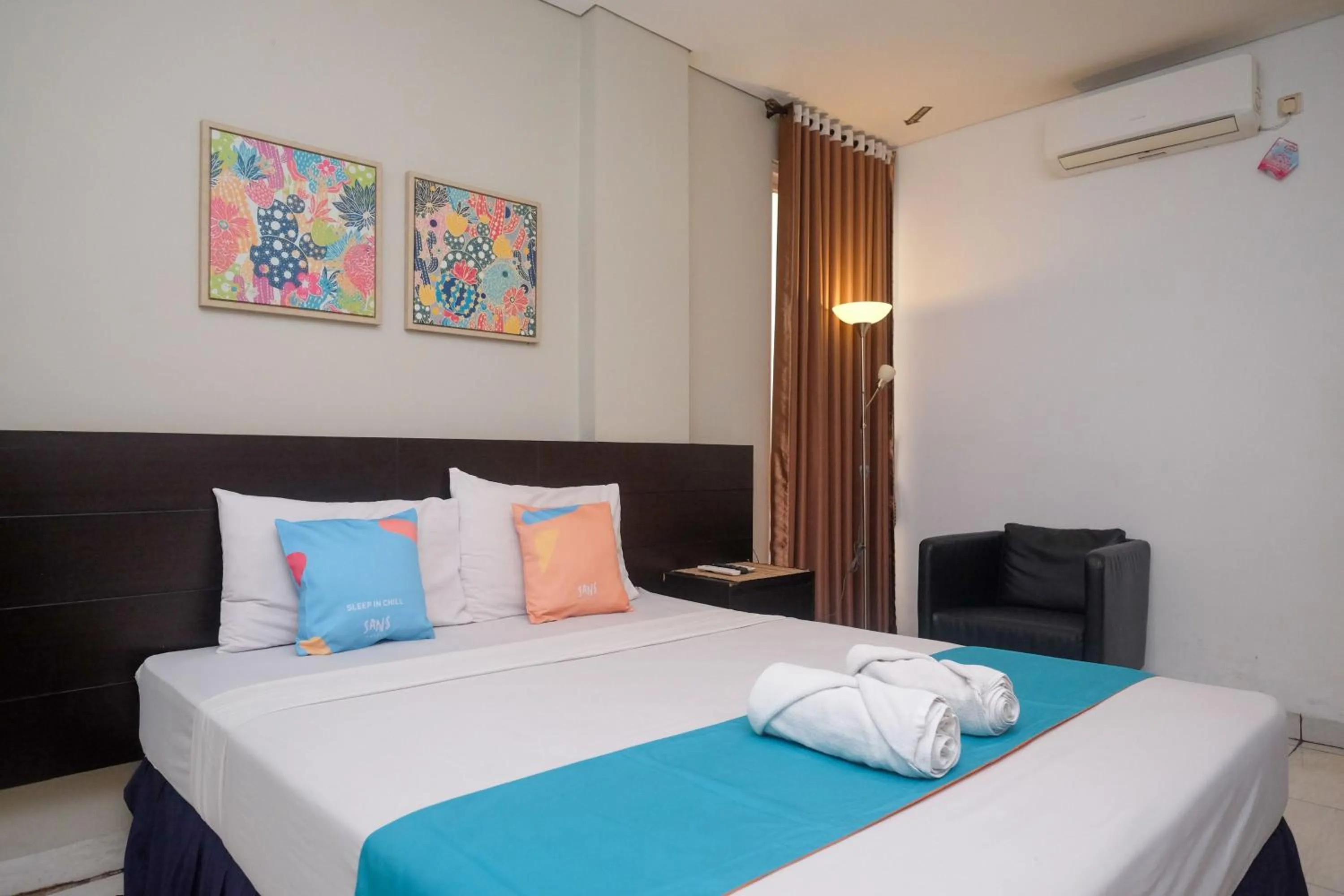 Bedroom, Bed in Sans Hotel Prime Cailendra Yogyakarta by RedDoorz