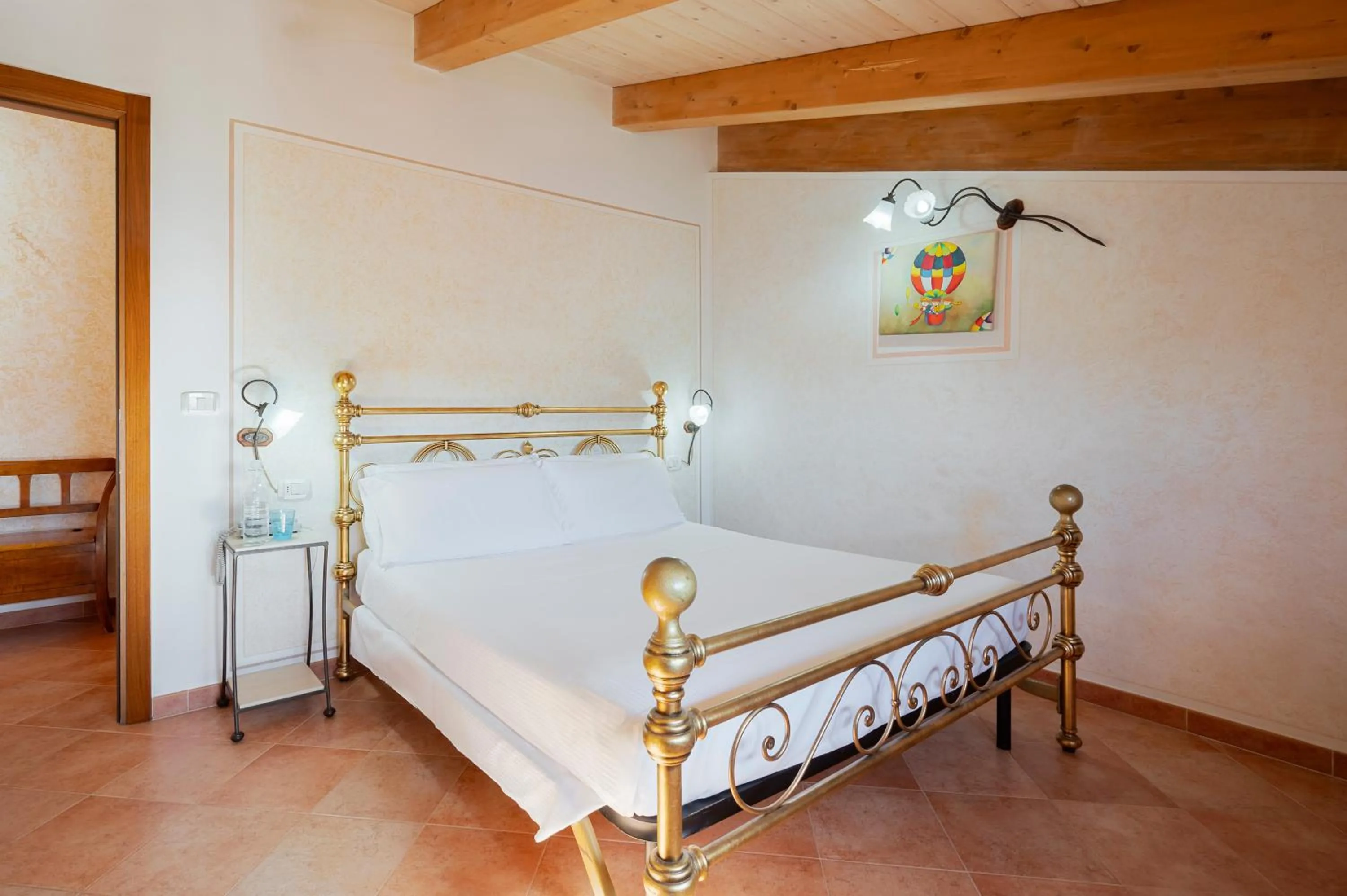 Bedroom in Lola Piccolo Hotel e Appartamenti