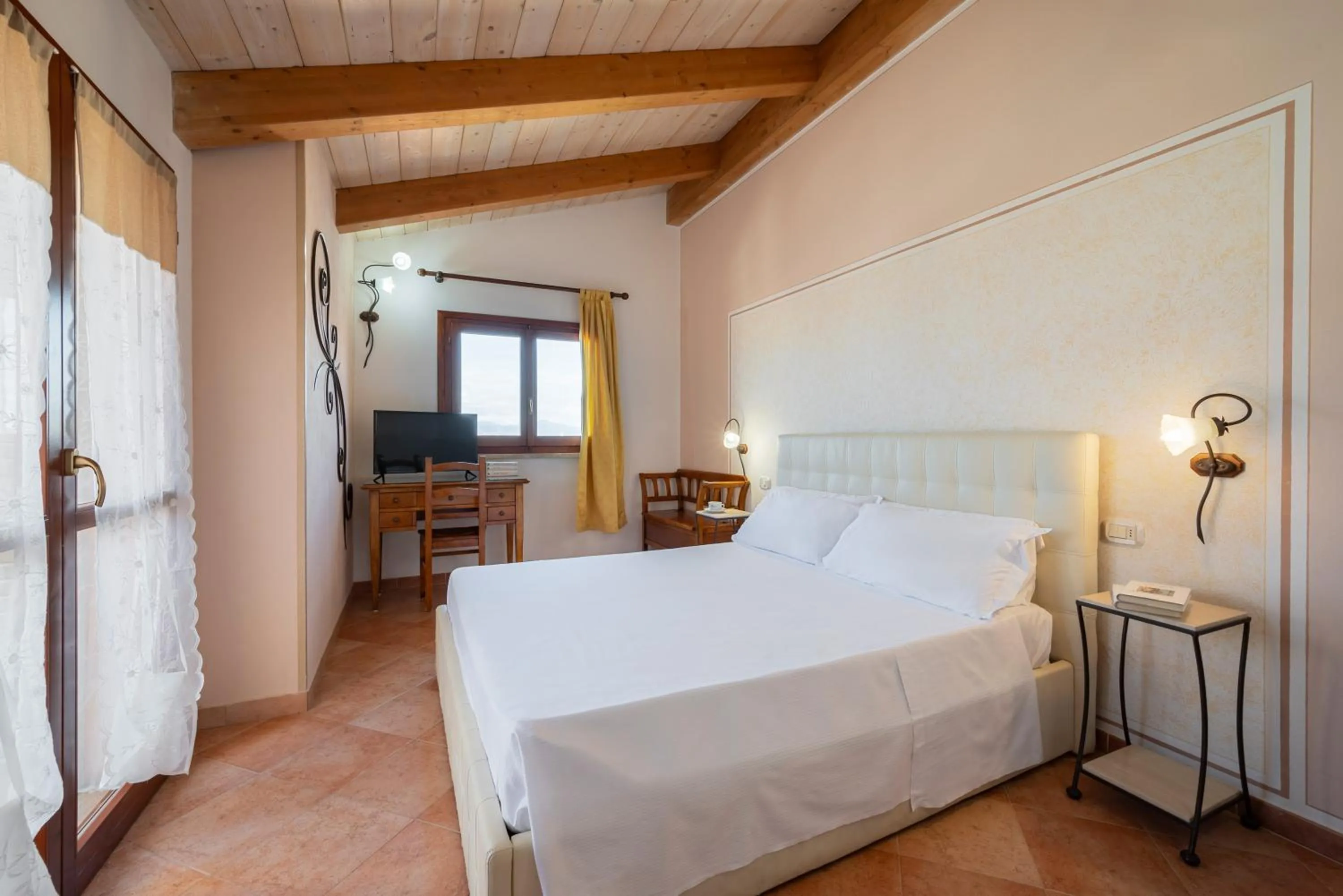 Bedroom in Lola Piccolo Hotel e Appartamenti