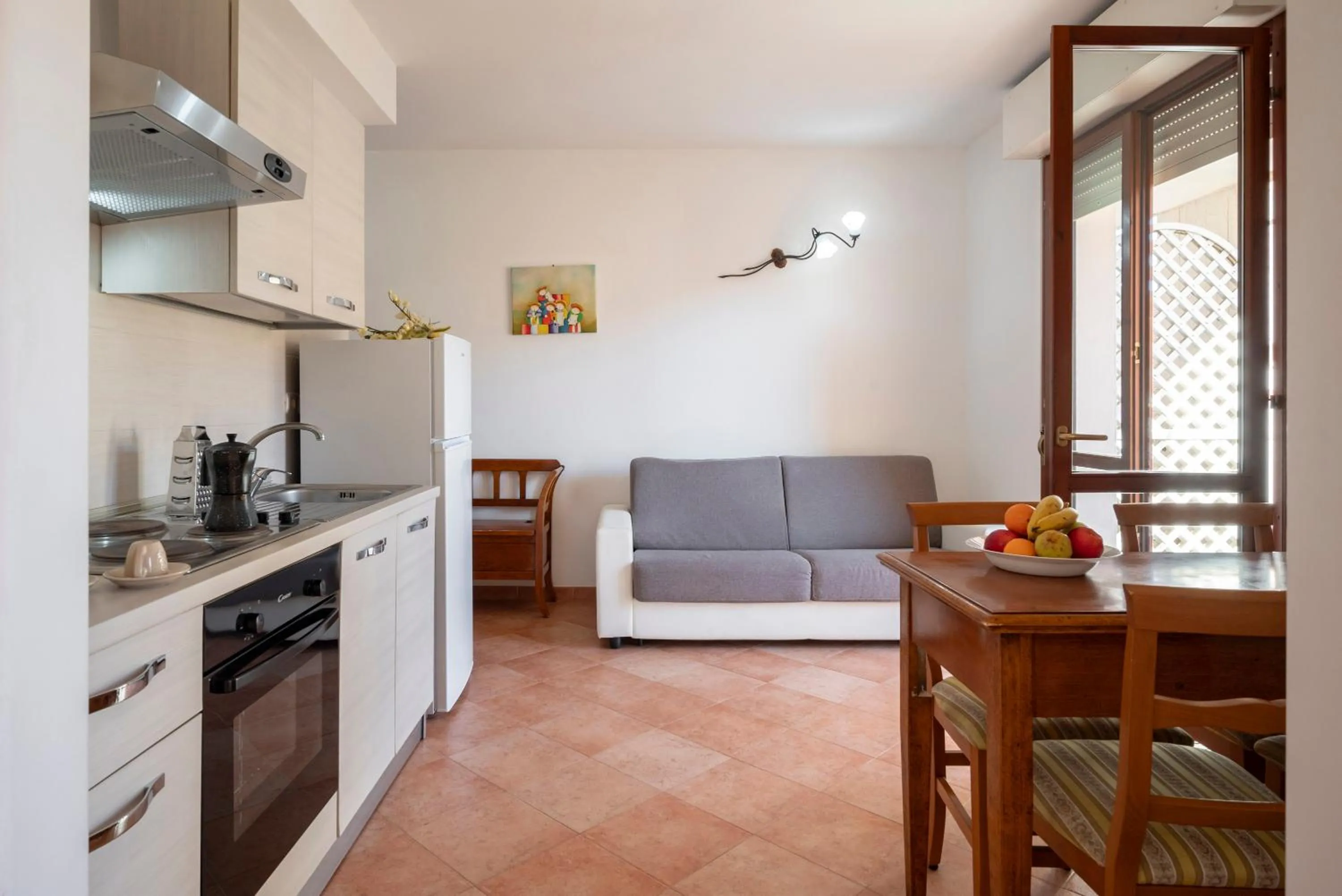 Kitchen or kitchenette in Lola Piccolo Hotel e Appartamenti