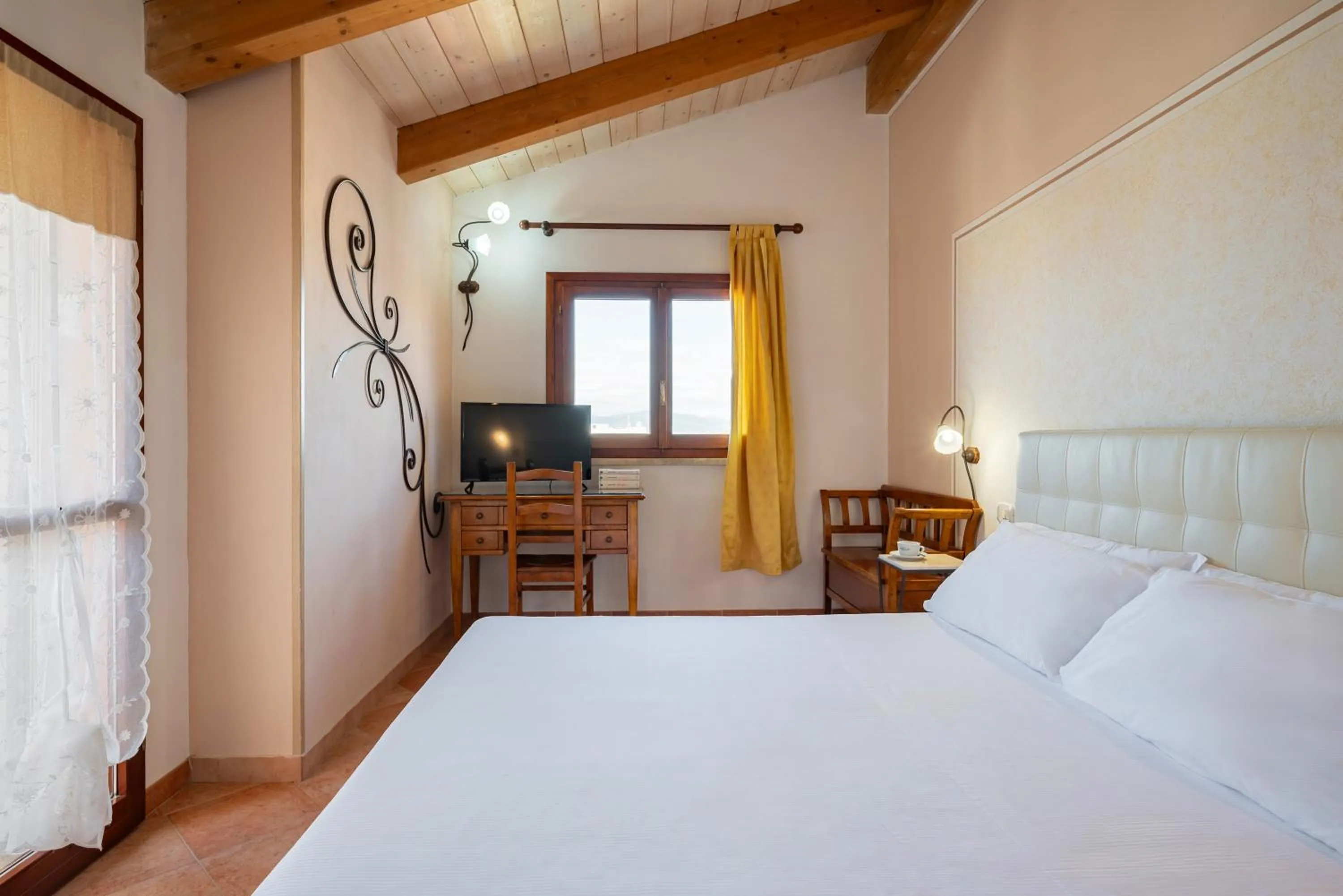 Bed in Lola Piccolo Hotel e Appartamenti