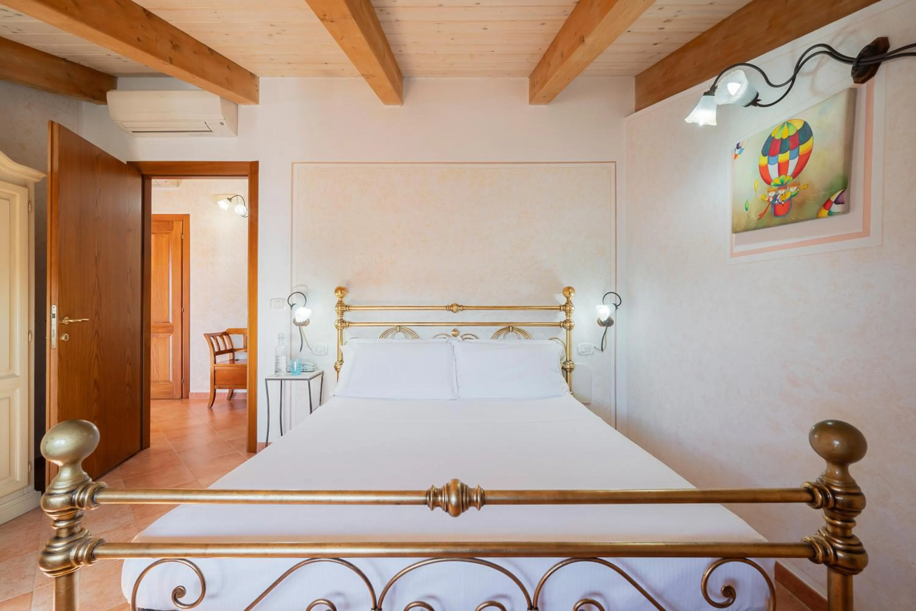 Bed in Lola Piccolo Hotel e Appartamenti