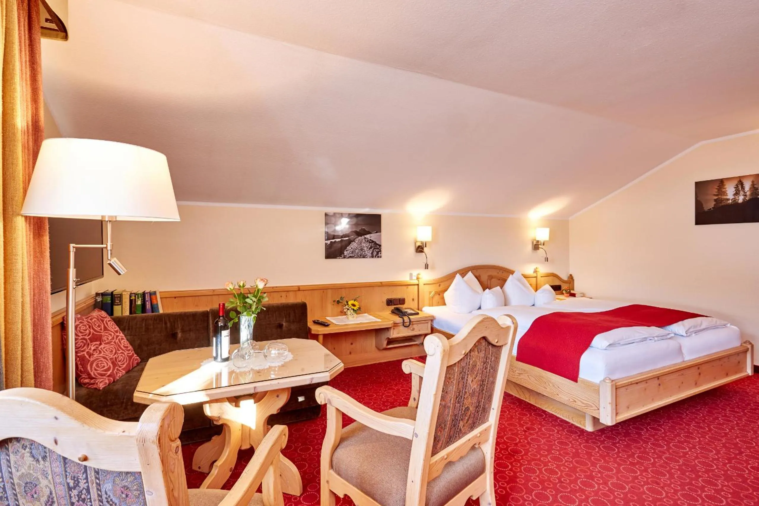 Seating area, Bed in Hotel Franziska