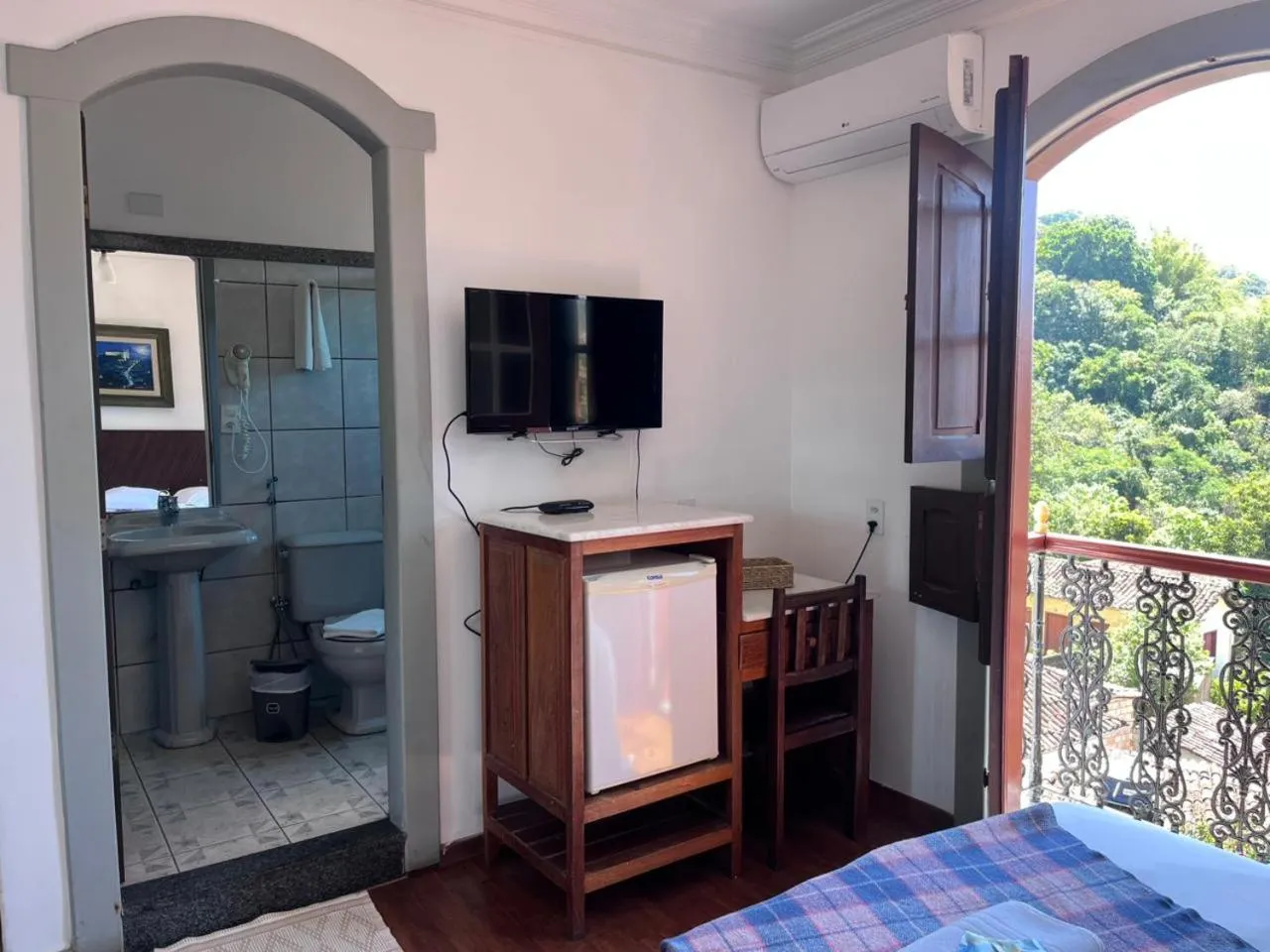 Bed in Pousada Casa dos Contos