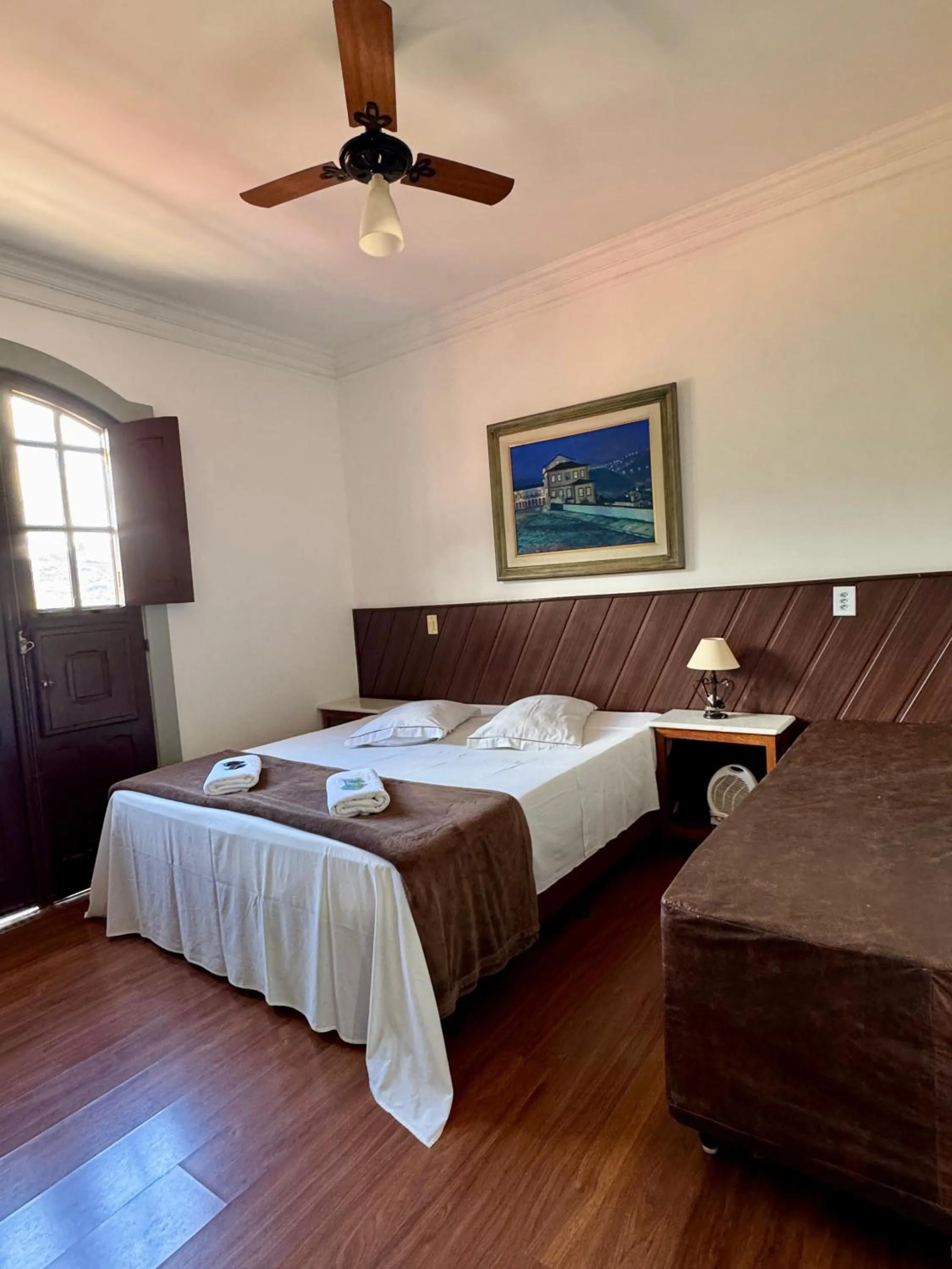 Bed in Pousada Casa dos Contos