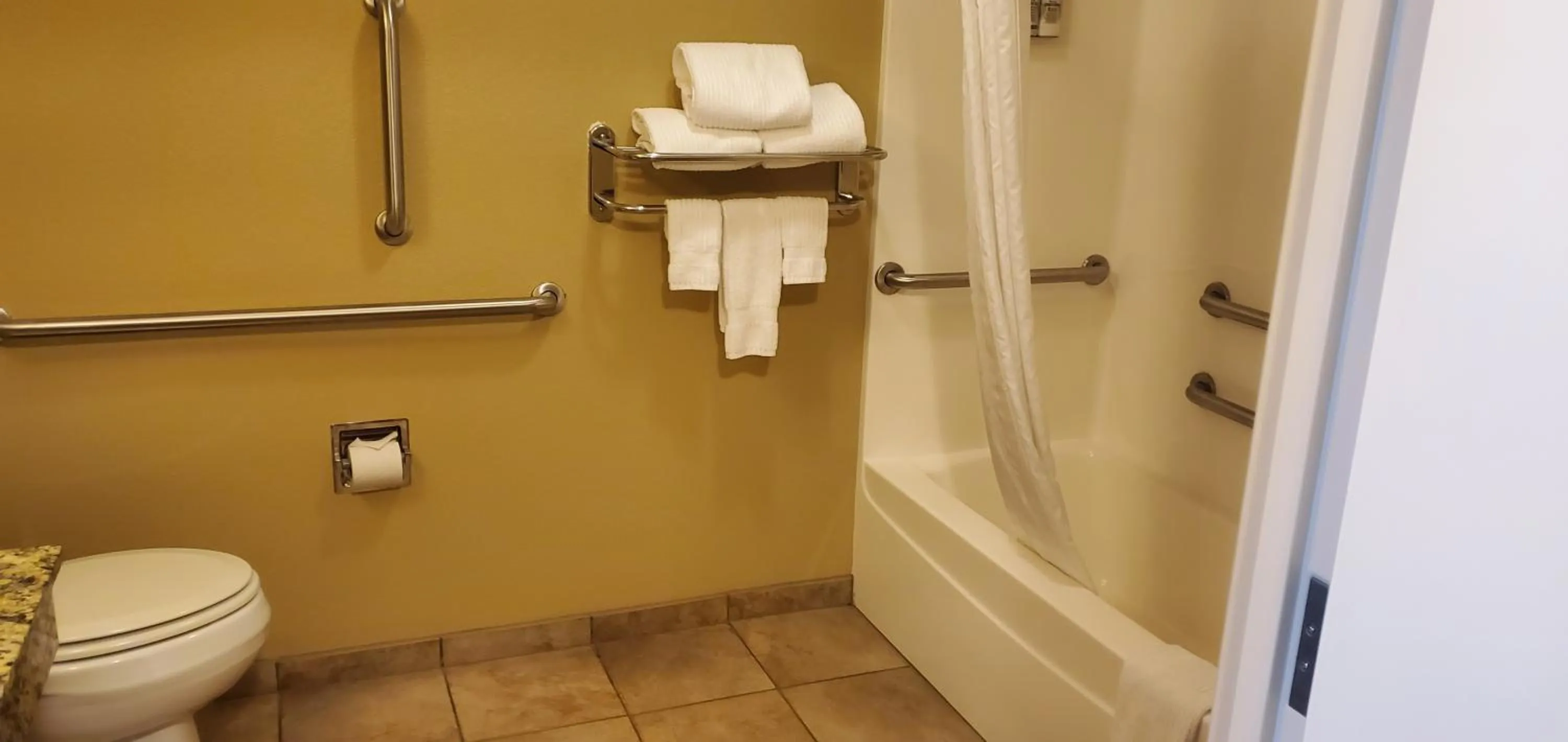 Bathroom in Candlewood Suites Champaign-Urbana University Area by IHG